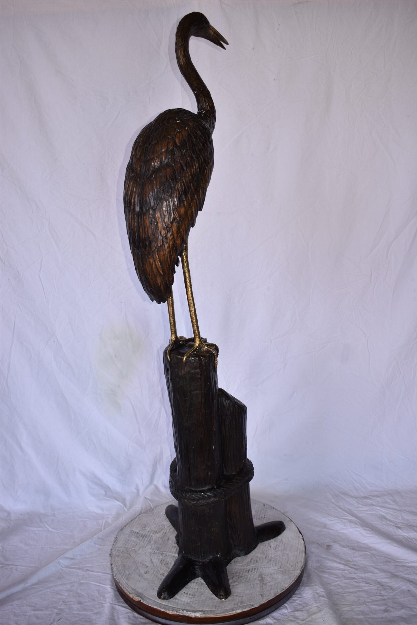 Crane Looking Out Standing on A Tree Stump Bronze Statue Size: 19" x 17" x 62"H