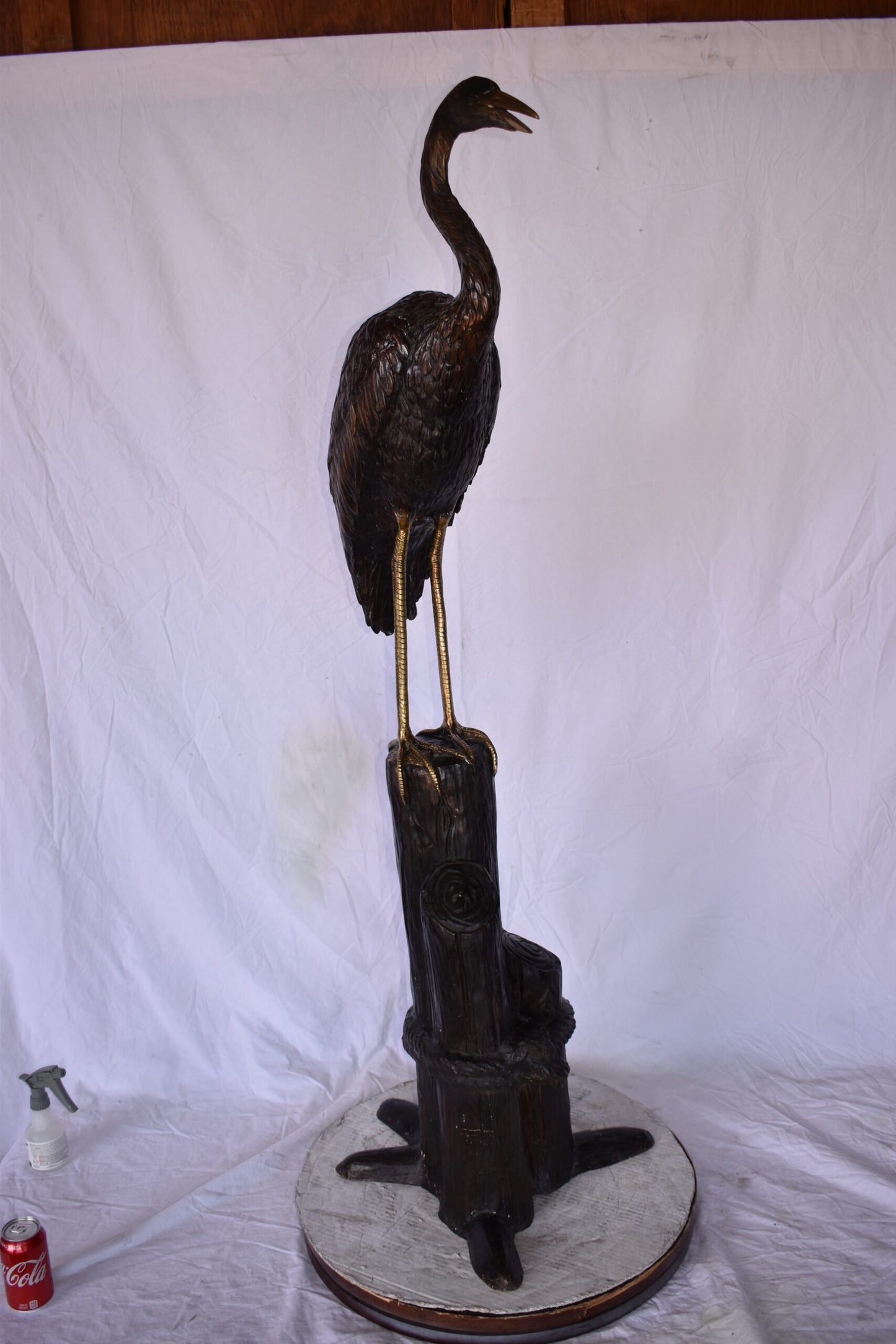 Crane Looking Out Standing on A Tree Stump Bronze Statue Size: 19" x 17" x 62"H