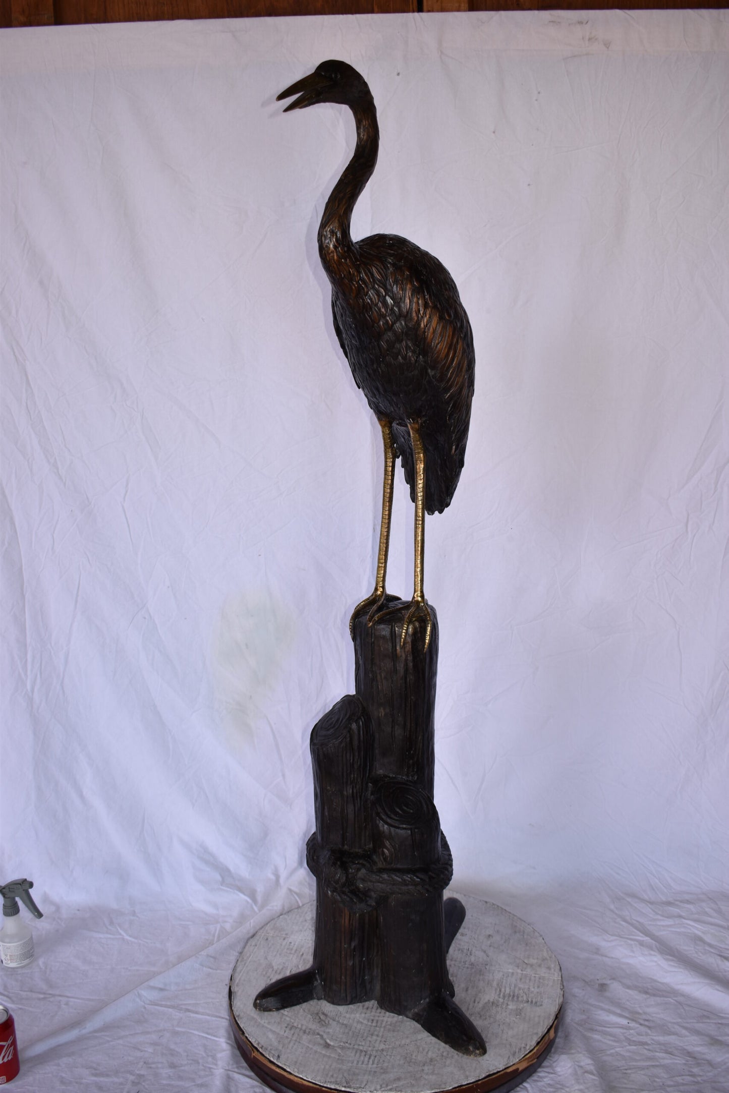 Crane Looking Out Standing on A Tree Stump Bronze Statue Size: 19" x 17" x 62"H