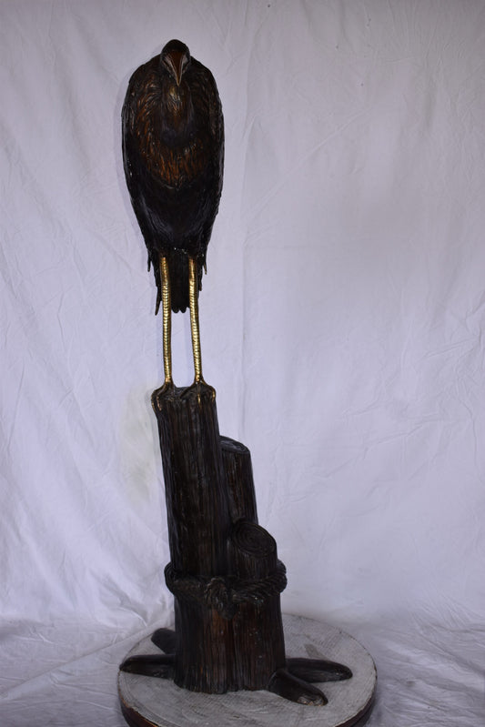 Crane Head Down Standing on A Tree Stump Bronze Statue Size: 23" x 16" x 55"H