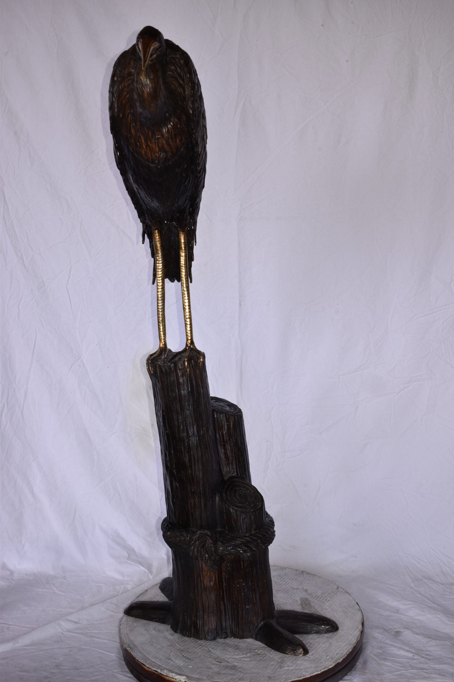 Crane Head Down Standing on A Tree Stump Bronze Statue Size: 23" x 16" x 55"H
