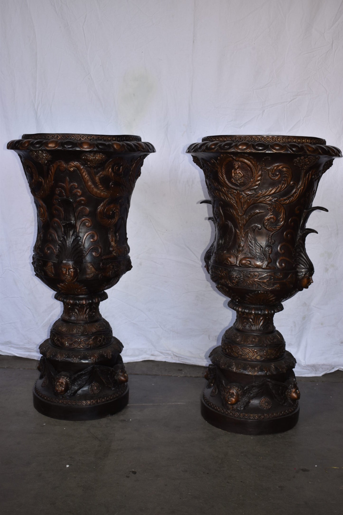 A Large Pair of Urns with Lady Faces Bronze Statue Size: 23" x 23" x 43"H