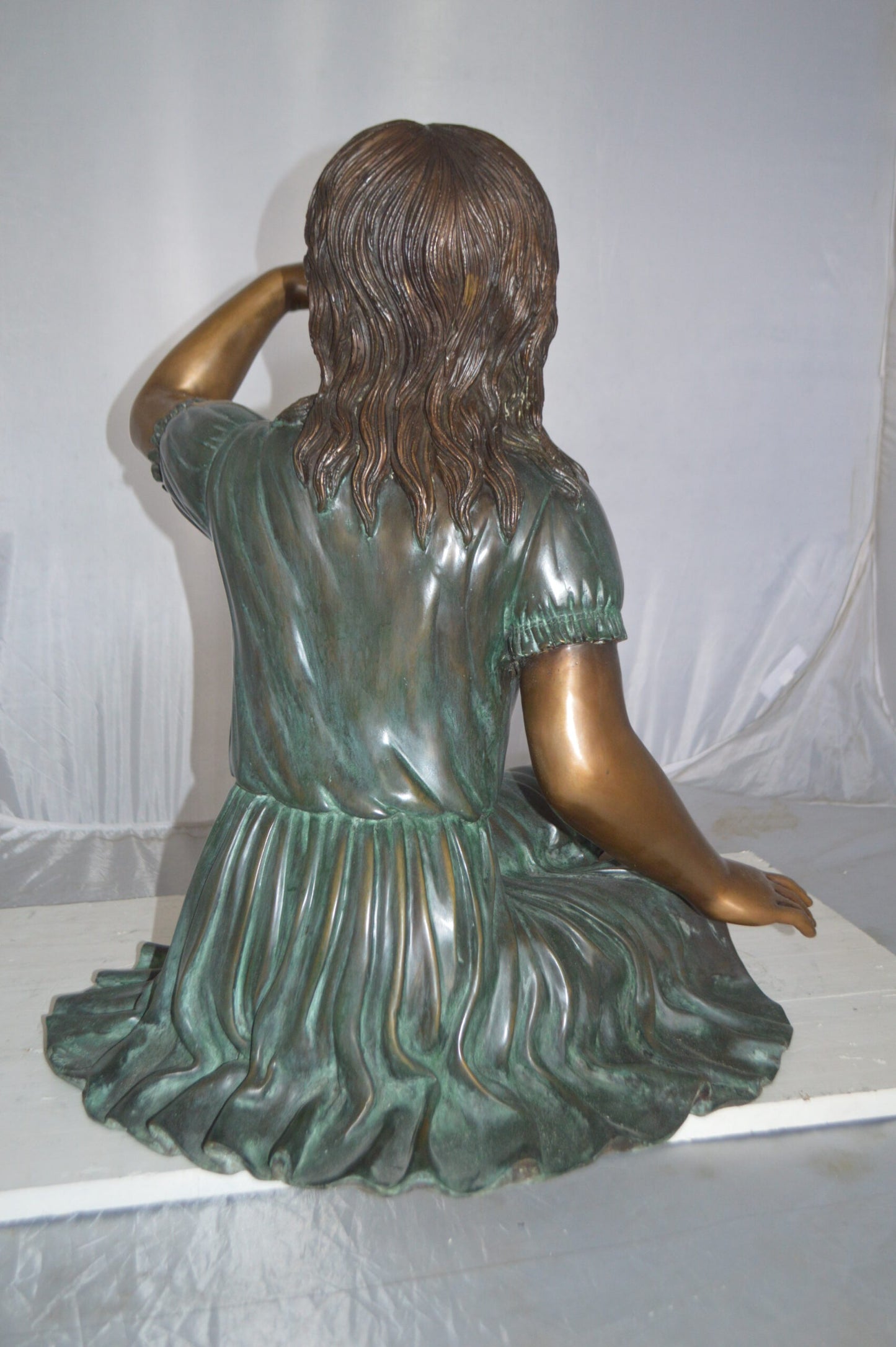 Girl with a Blue Sparrow Bronze Statue - Size: 26"L x 31"W x 25"H.