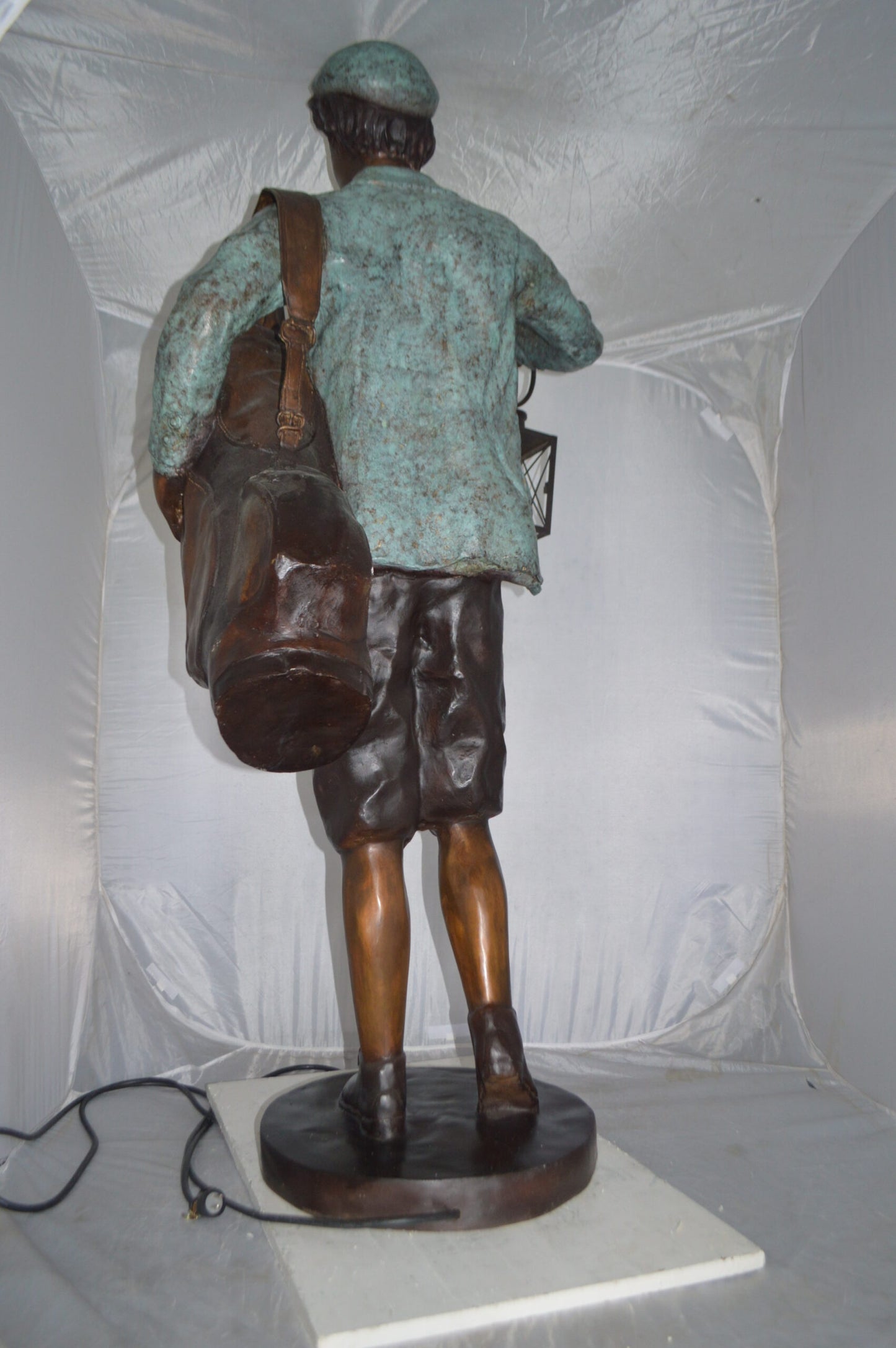 Caddy with light Bronze Statue - Size: 30"L x 36"W x 64"H.
