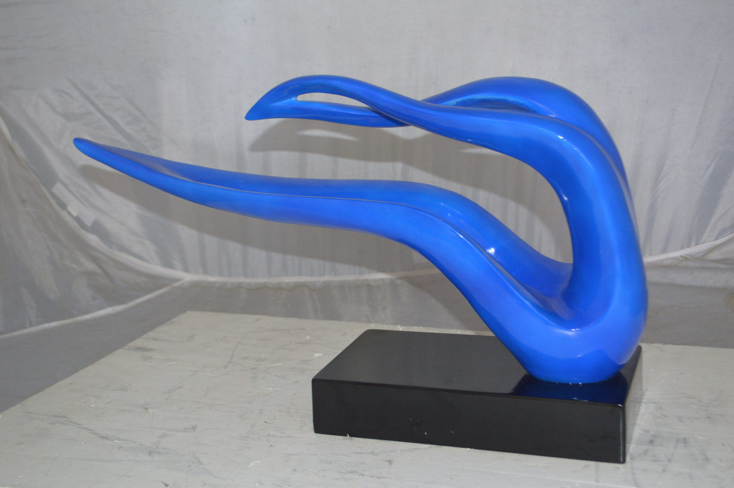 Modern Art Blue Ribbon Resin Statue - Size: 25"L x 6"W x 13"H.