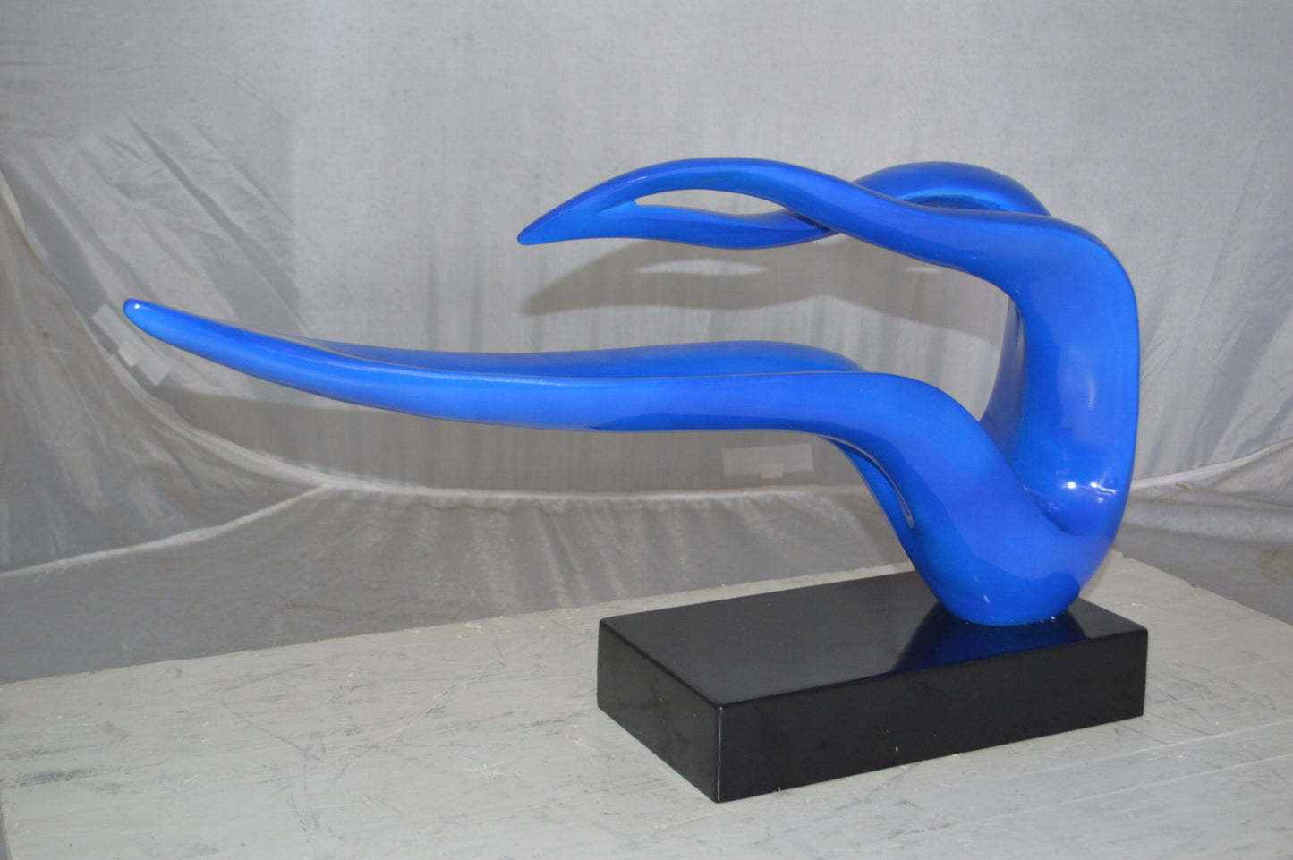 Modern Art Blue Ribbon Resin Statue - Size: 25"L x 6"W x 13"H.