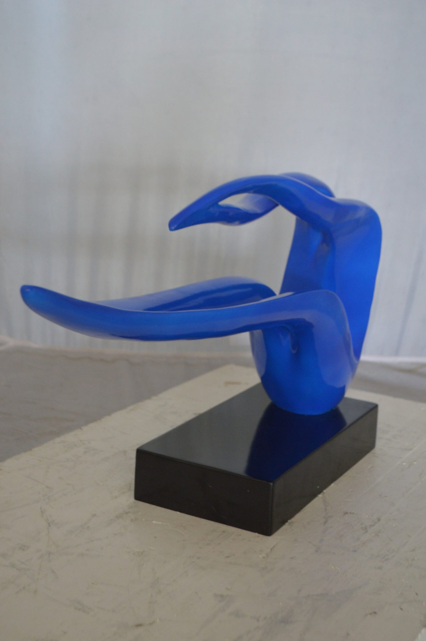 Modern Art Blue Ribbon Resin Statue - Size: 25"L x 6"W x 13"H.