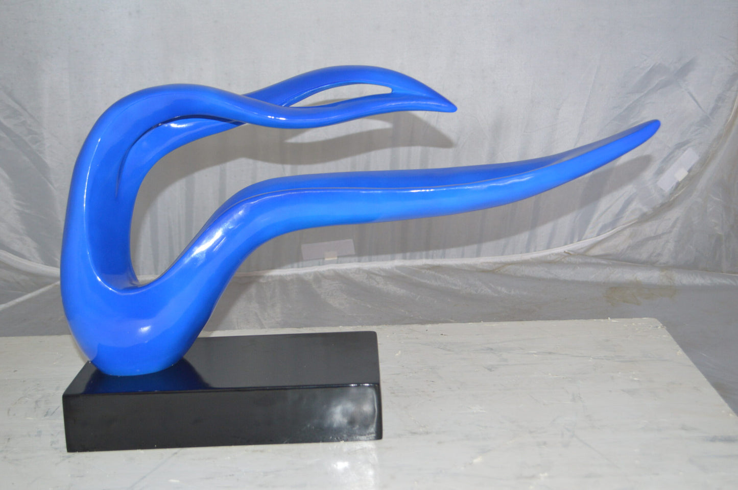 Modern Art Blue Ribbon Resin Statue - Size: 25"L x 6"W x 13"H.