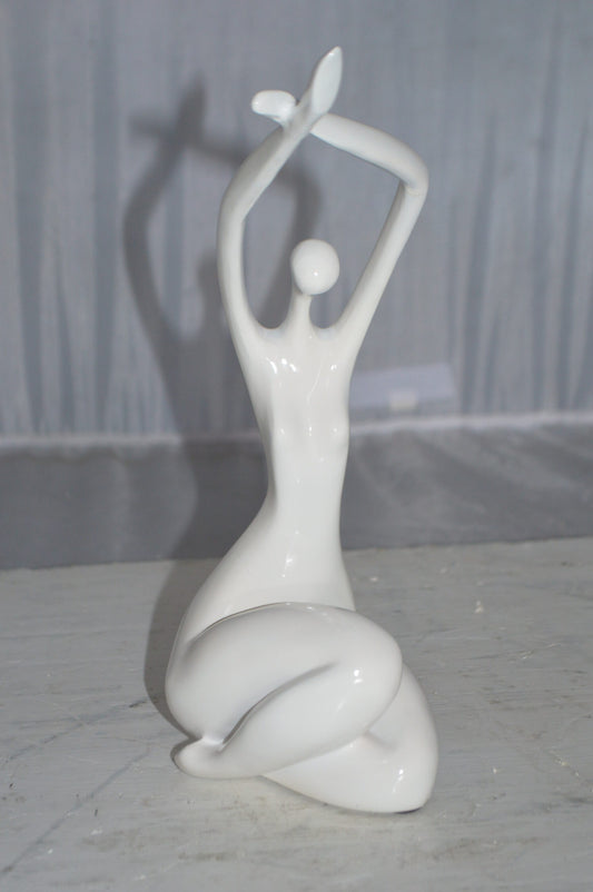 Modern Art Dancer in Action White Resin Statue -  Size: 4"L x 6"W x 13"H.