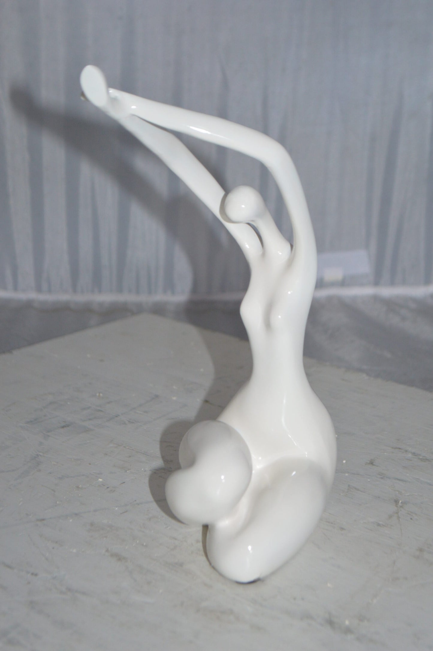 Modern Art Dancer in Action White Resin Statue - Size: 4"L x 6"W x 13"H.