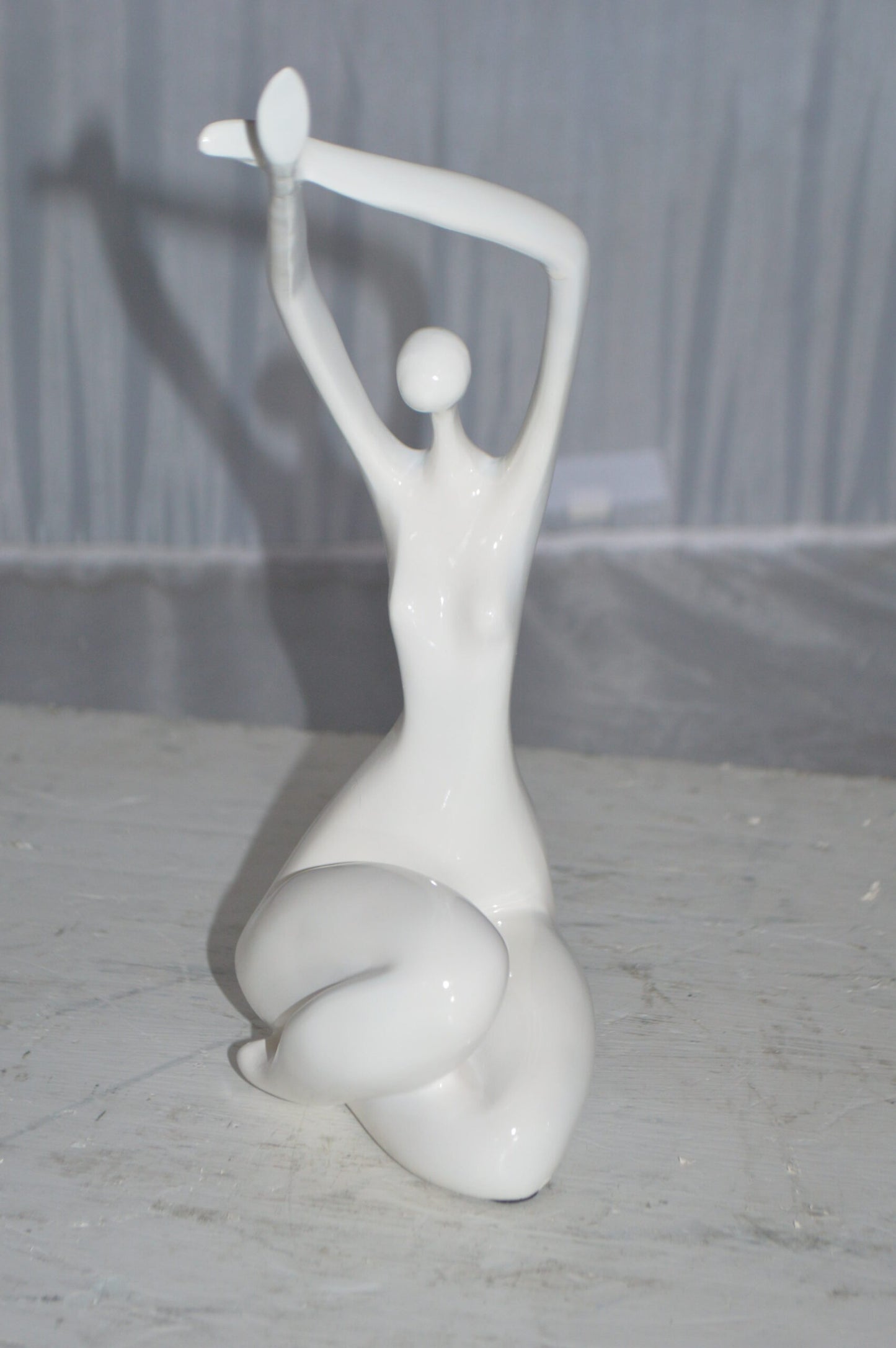 Modern Art Dancer in Action White Resin Statue - Size: 4"L x 6"W x 13"H.