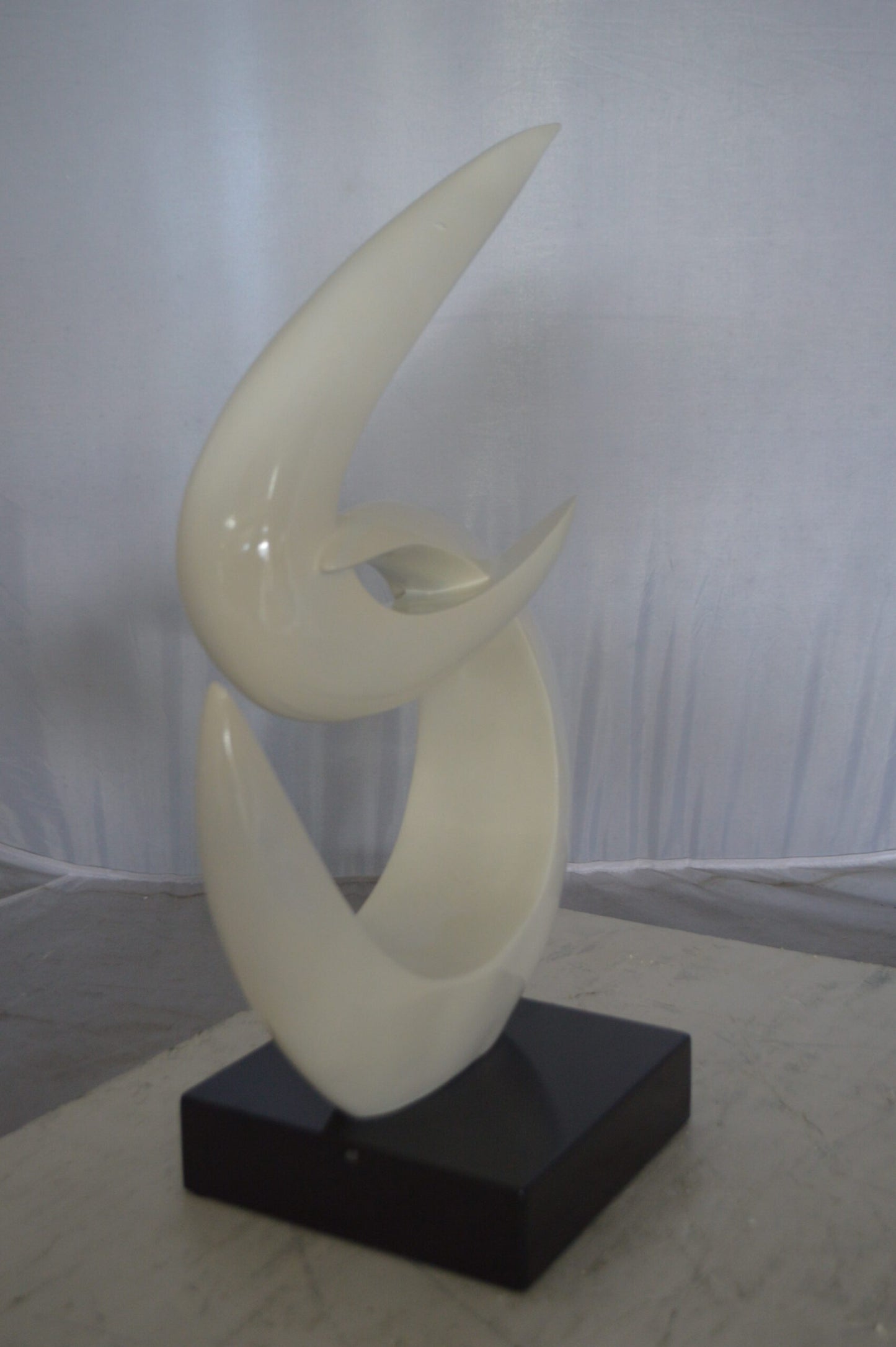 Modern Art White Boomerang Statue made of Resin - Size: 13"L x 8"W x 23"H.