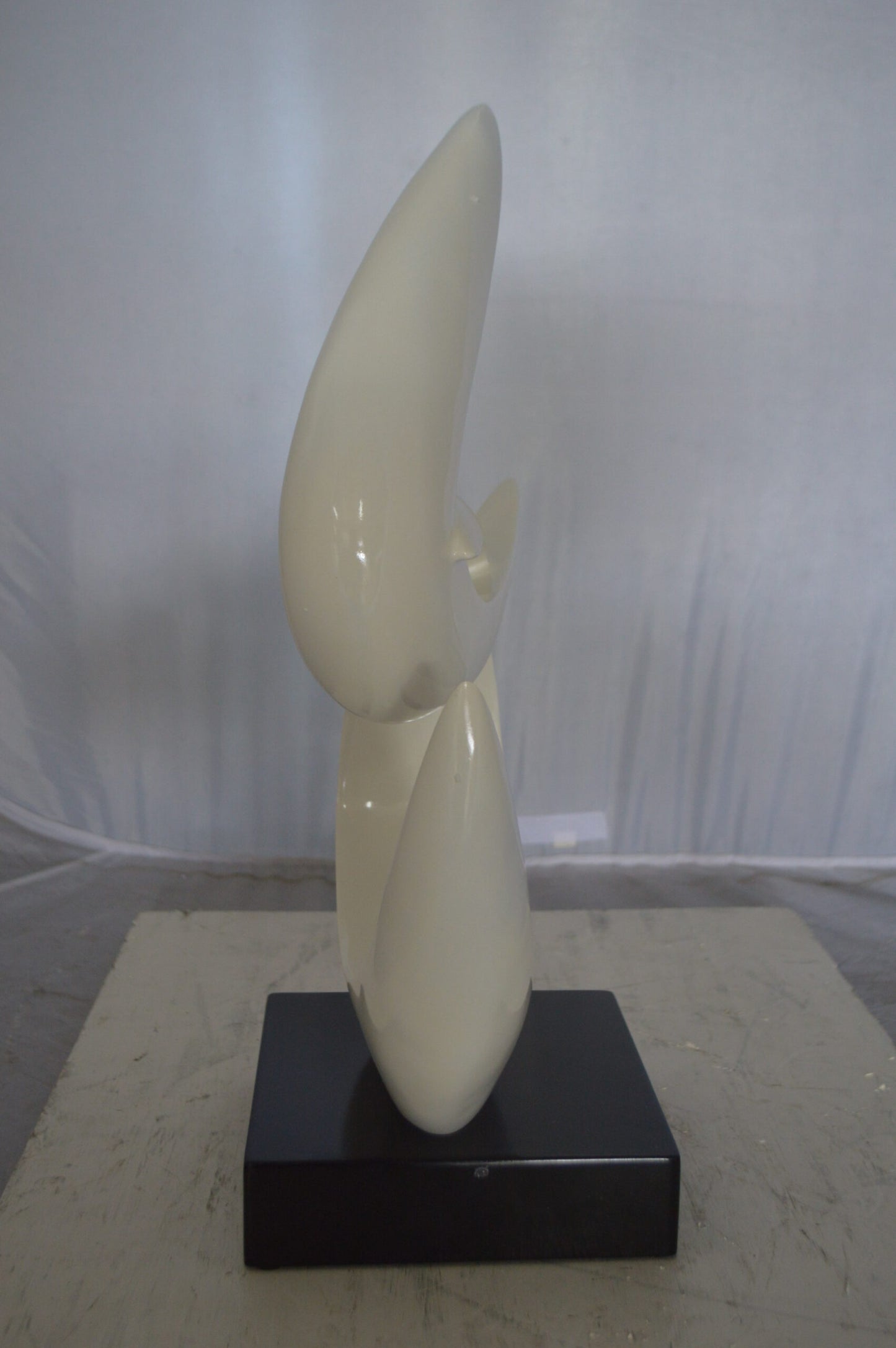 Modern Art White Boomerang Statue made of Resin - Size: 13"L x 8"W x 23"H.