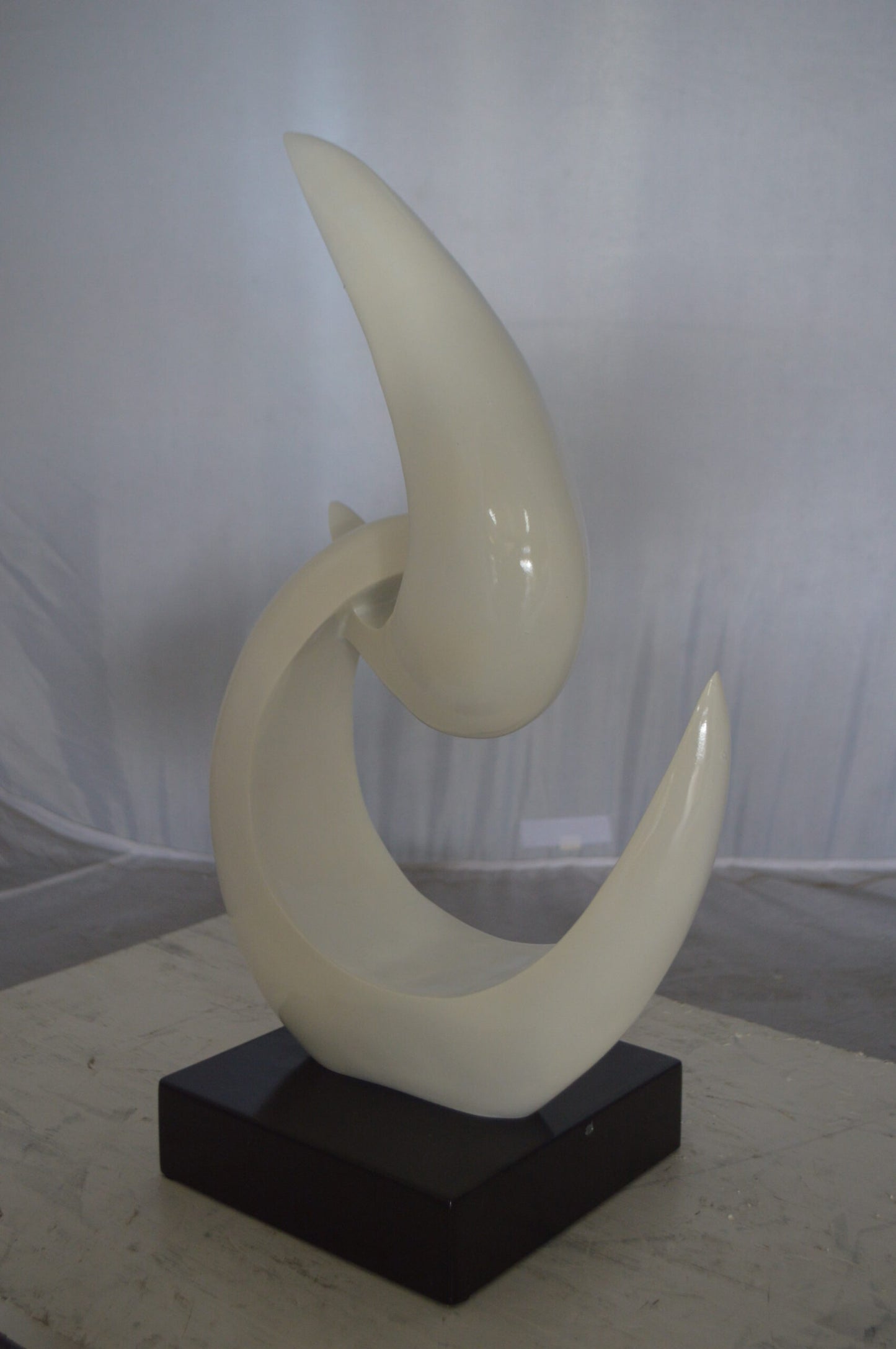 Modern Art White Boomerang Statue made of Resin - Size: 13"L x 8"W x 23"H.
