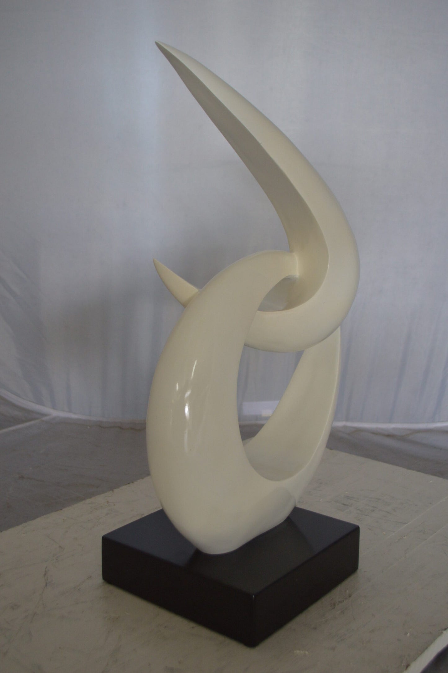 Modern Art White Boomerang Statue made of Resin - Size: 13"L x 8"W x 23"H.