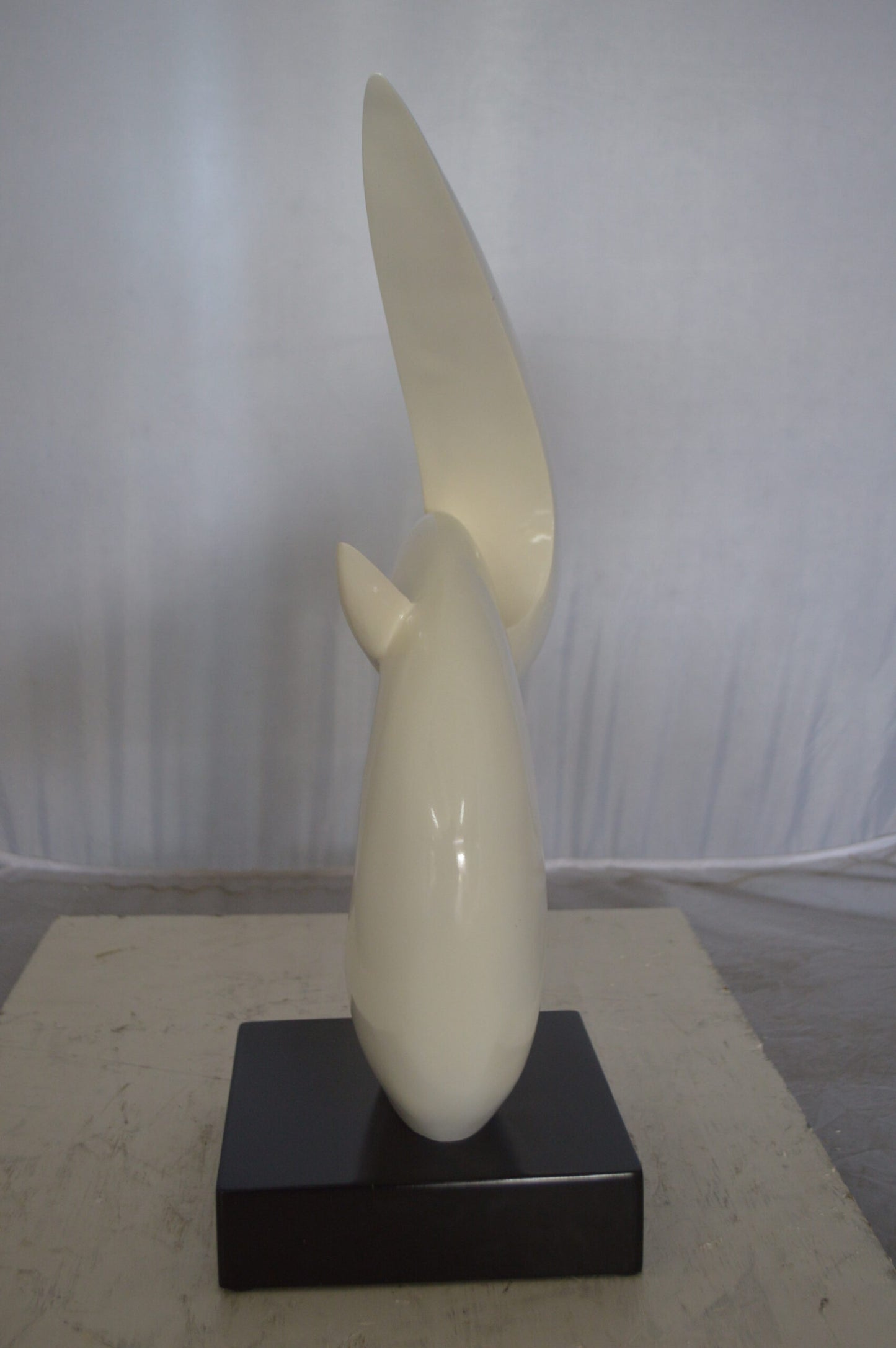 Modern Art White Boomerang Statue made of Resin - Size: 13"L x 8"W x 23"H.