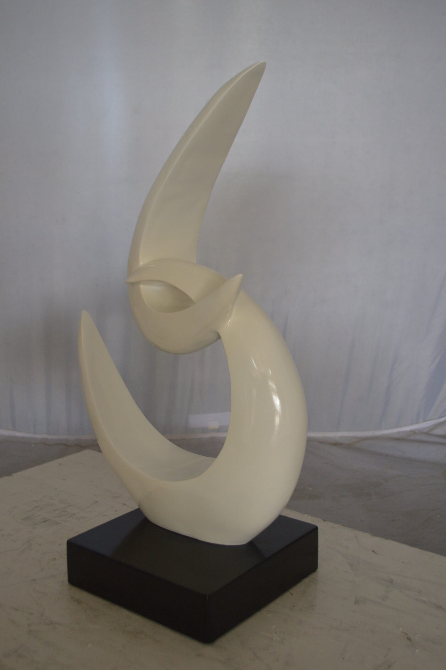 Modern Art White Boomerang Statue made of Resin - Size: 13"L x 8"W x 23"H.