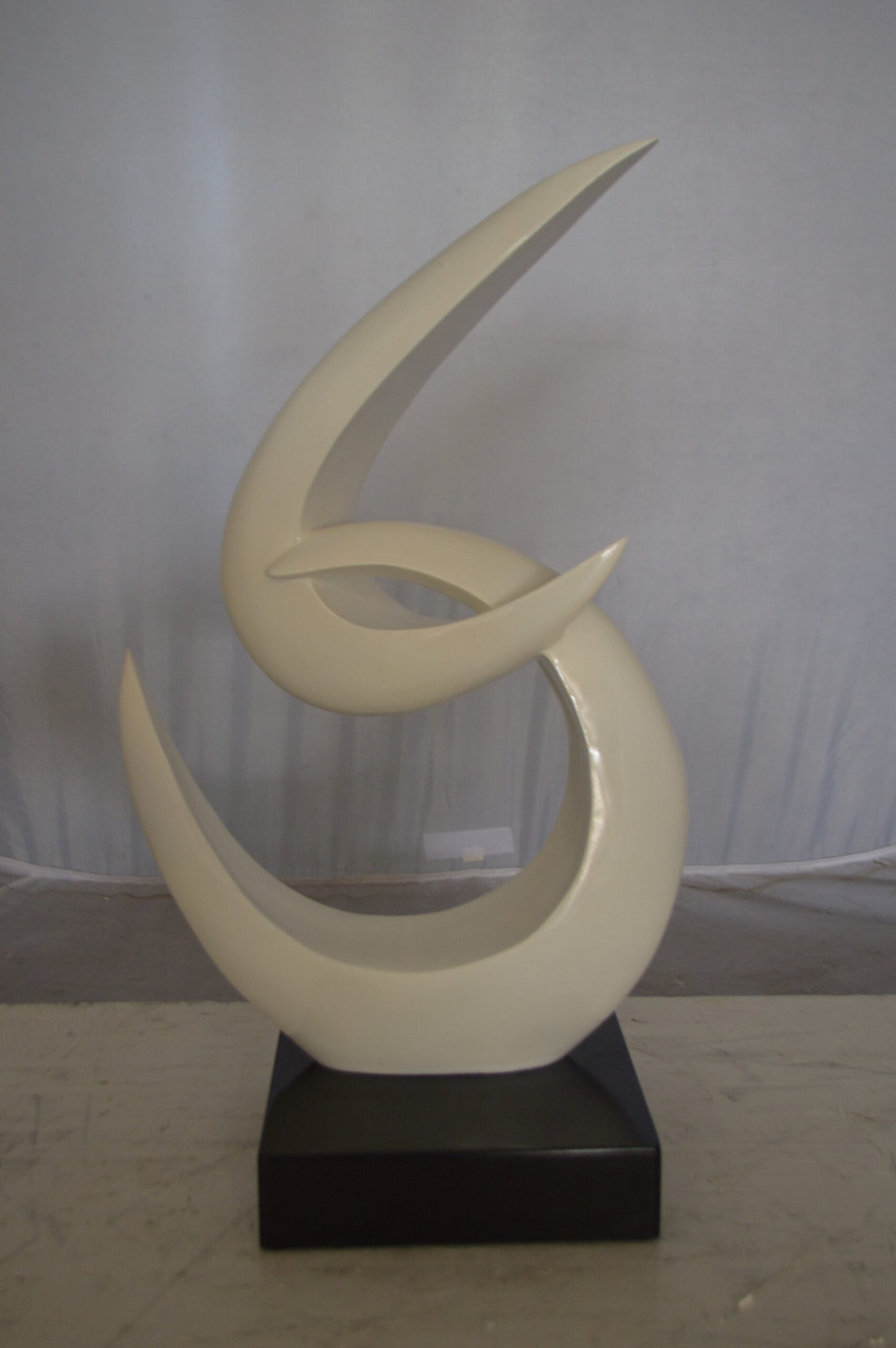 Modern Art White Boomerang Statue made of Resin -  Size: 13"L x 8"W x 23"H.