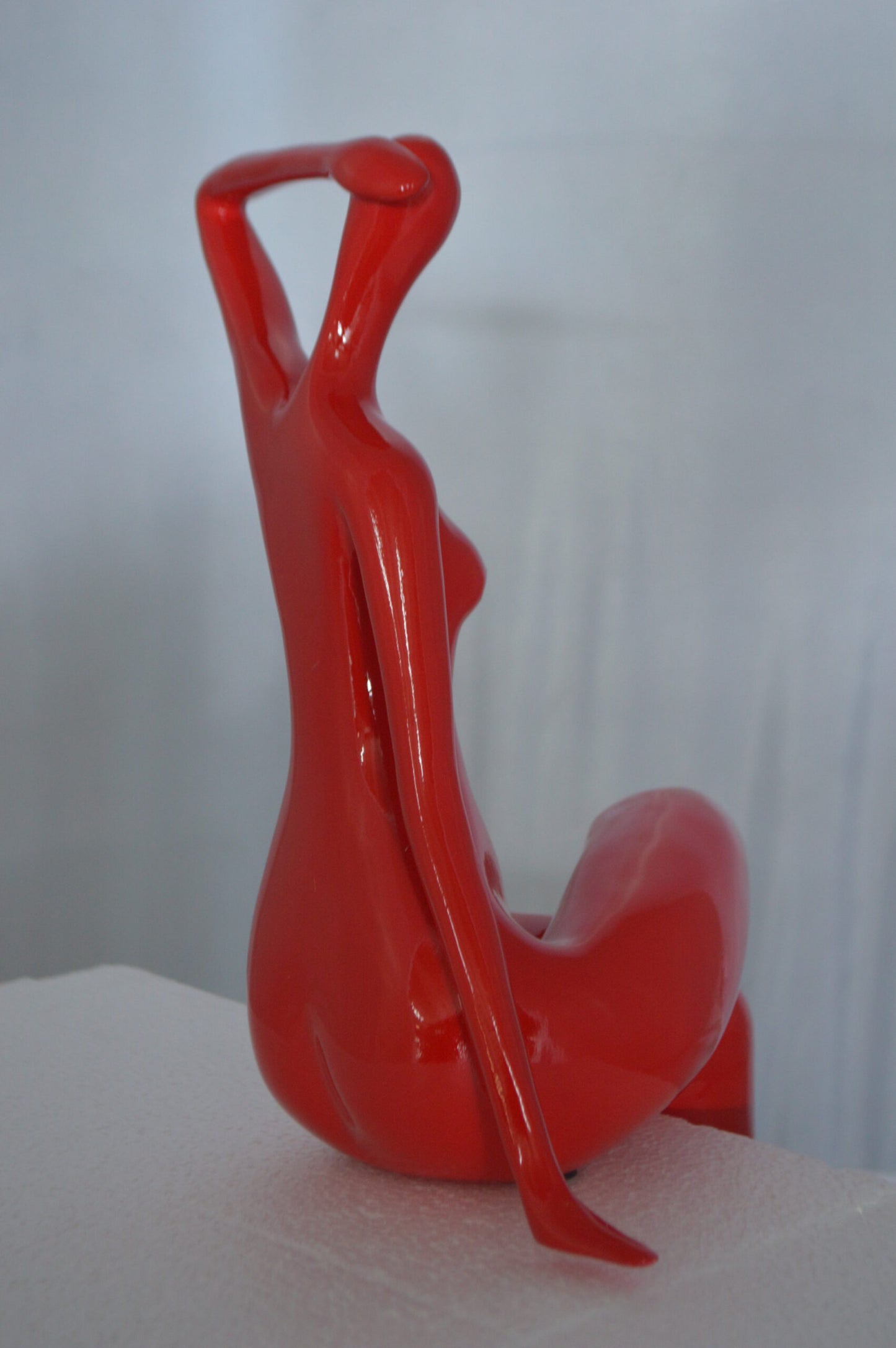 Modern Art Sitting on Edge Girl Made of Resin - Size: 9"L x 7"W x 16"H.