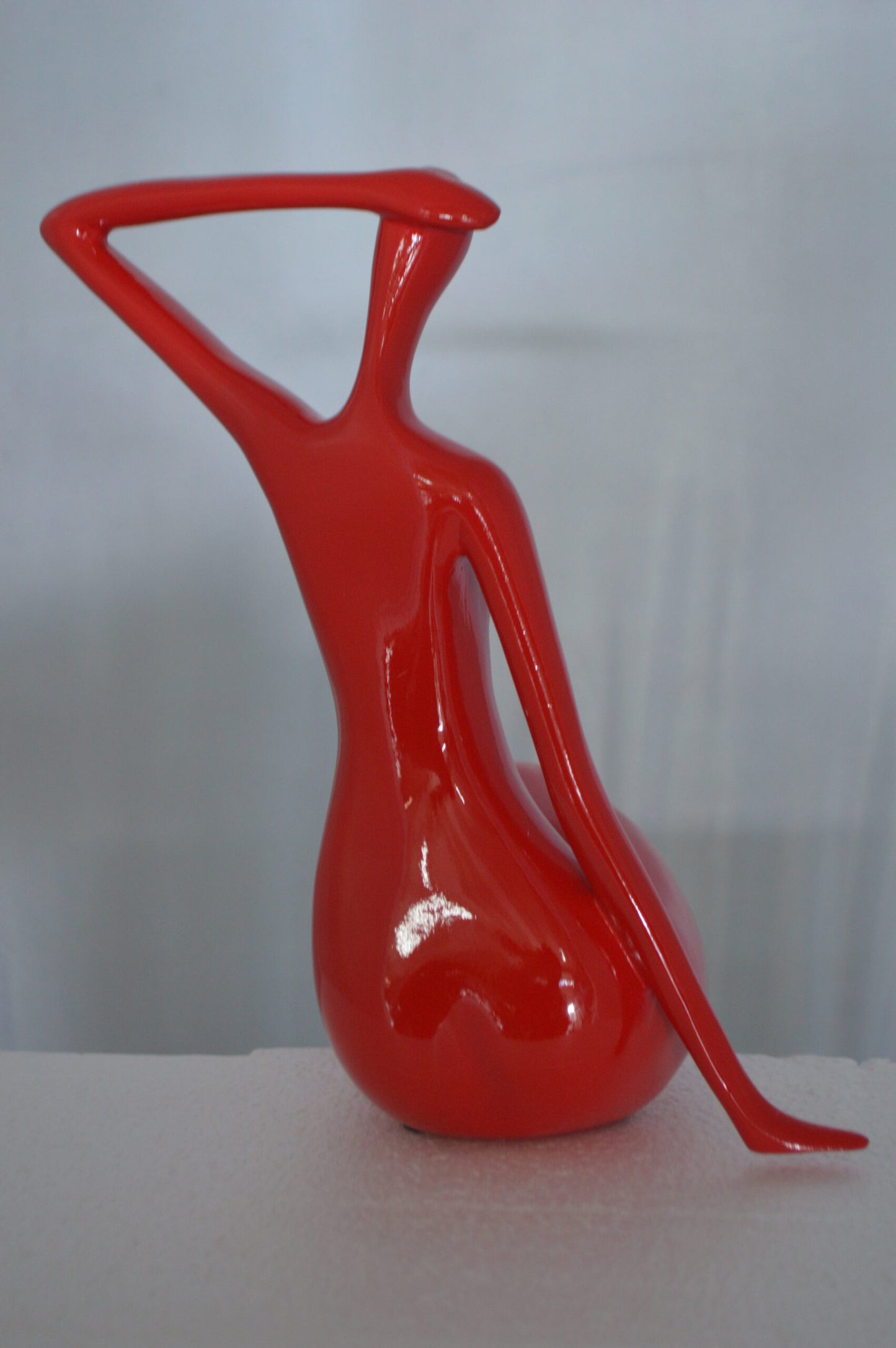 Modern Art Sitting on Edge Girl Made of Resin - Size: 9"L x 7"W x 16"H.
