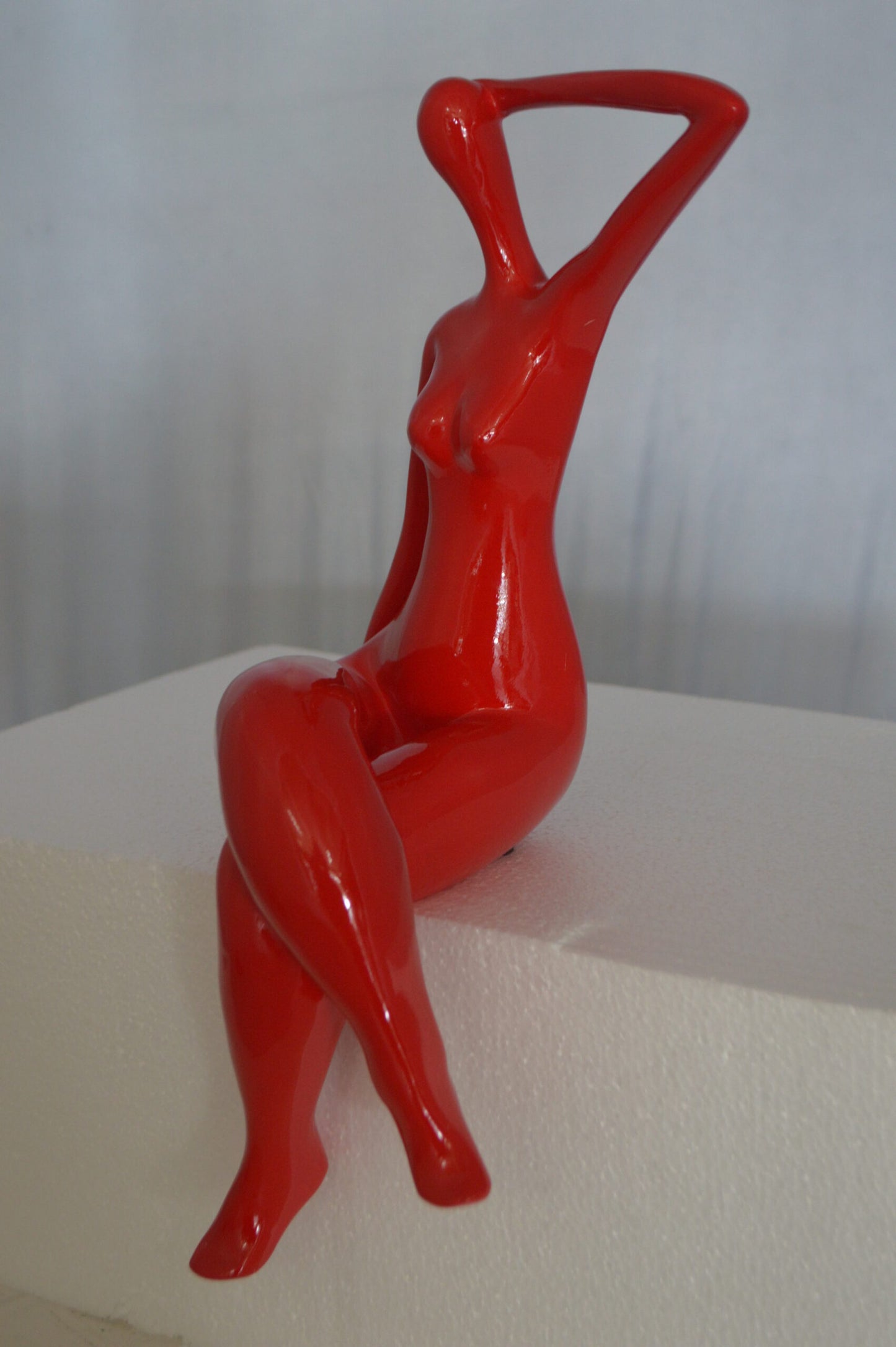 Modern Art Sitting on Edge Girl Made of Resin - Size: 9"L x 7"W x 16"H.