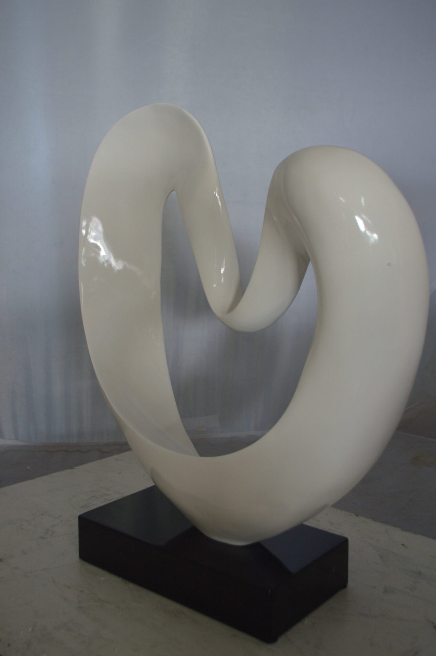 Modern Art White Love Statue Made of Resin - Size: 19"L x 6"W x 22"H.
