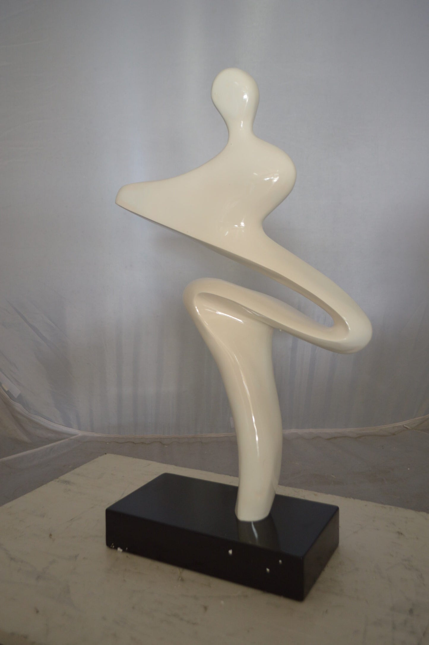 Modern Art Windy Day Resin Statue - Size: 15"L x 6"W x 24"H.