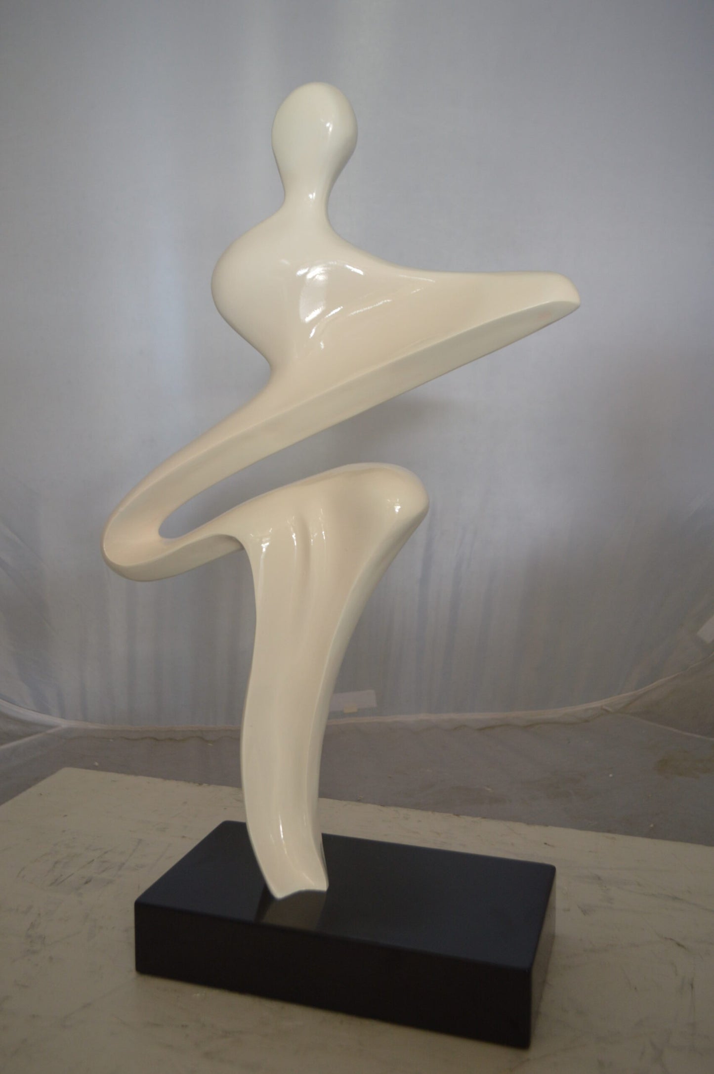 Modern Art Windy Day Resin Statue - Size: 15"L x 6"W x 24"H.