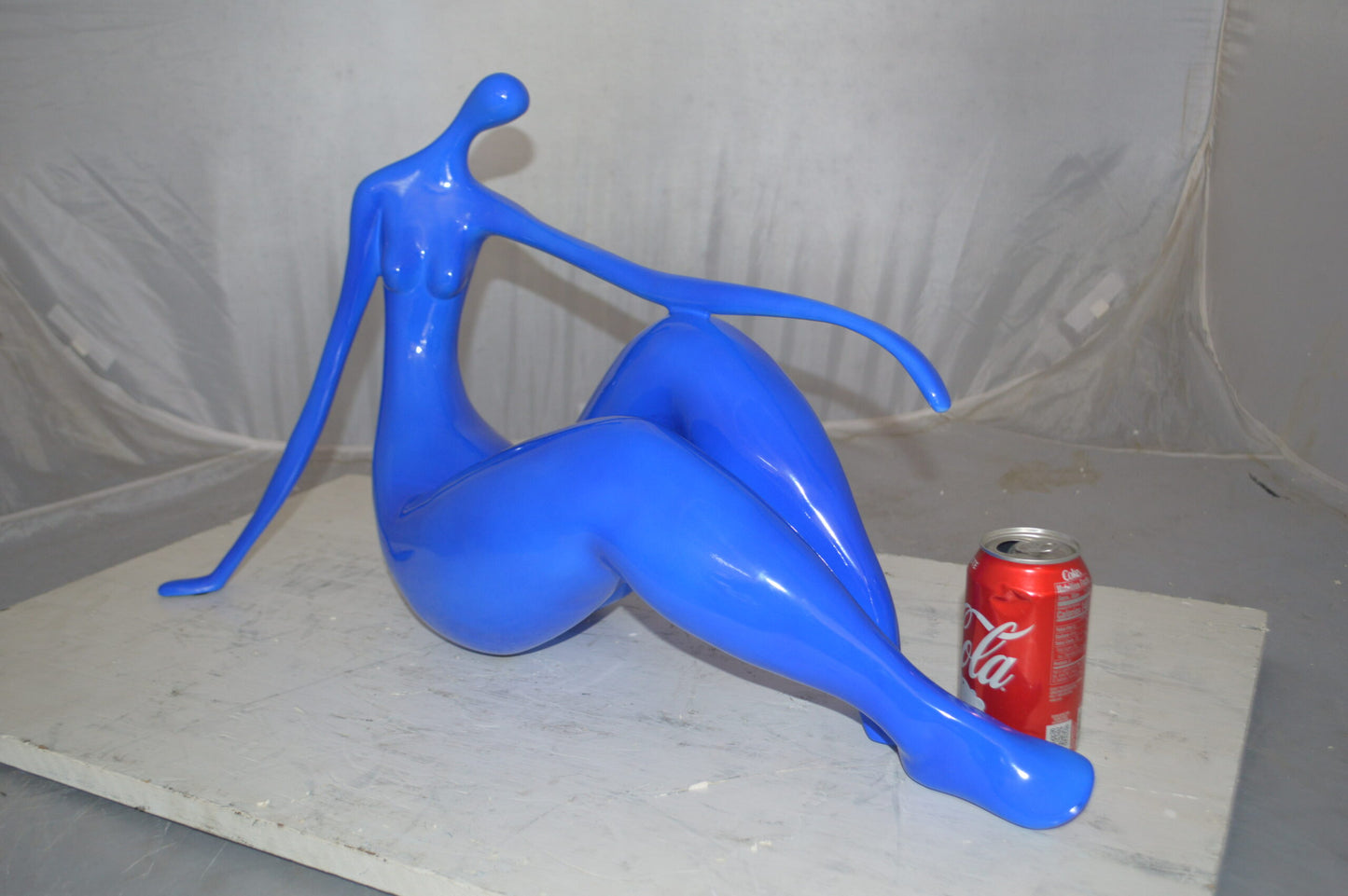 Modern Art Blue Women on the Beach Resin Statue - Size: 27"L x 8"W x 15"H.