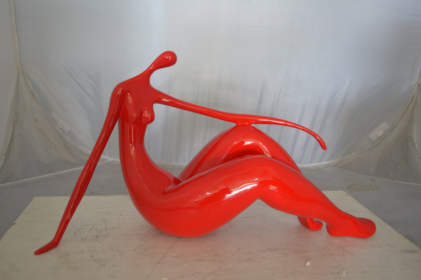 Modern Art Red Women on the Beach Resin Statue - Size: 27"L x 8"W x 15"H.