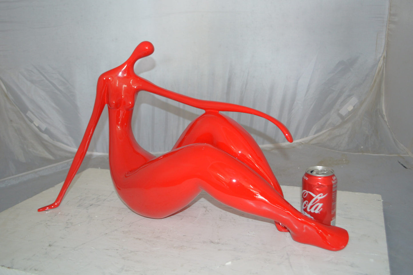 Modern Art Red Women on the Beach Resin Statue - Size: 27"L x 8"W x 15"H.
