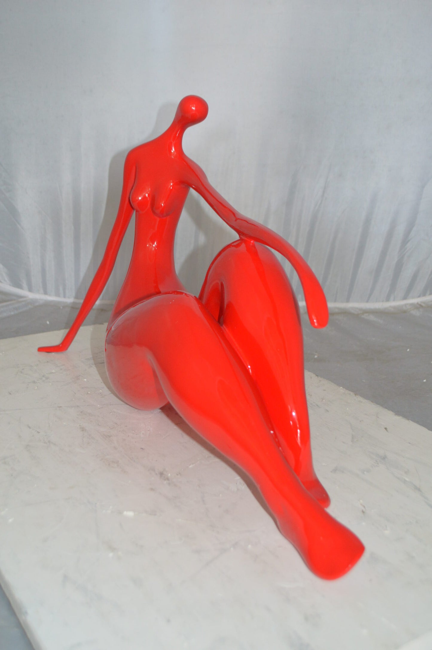 Modern Art Red Women on the Beach Resin Statue - Size: 27"L x 8"W x 15"H.