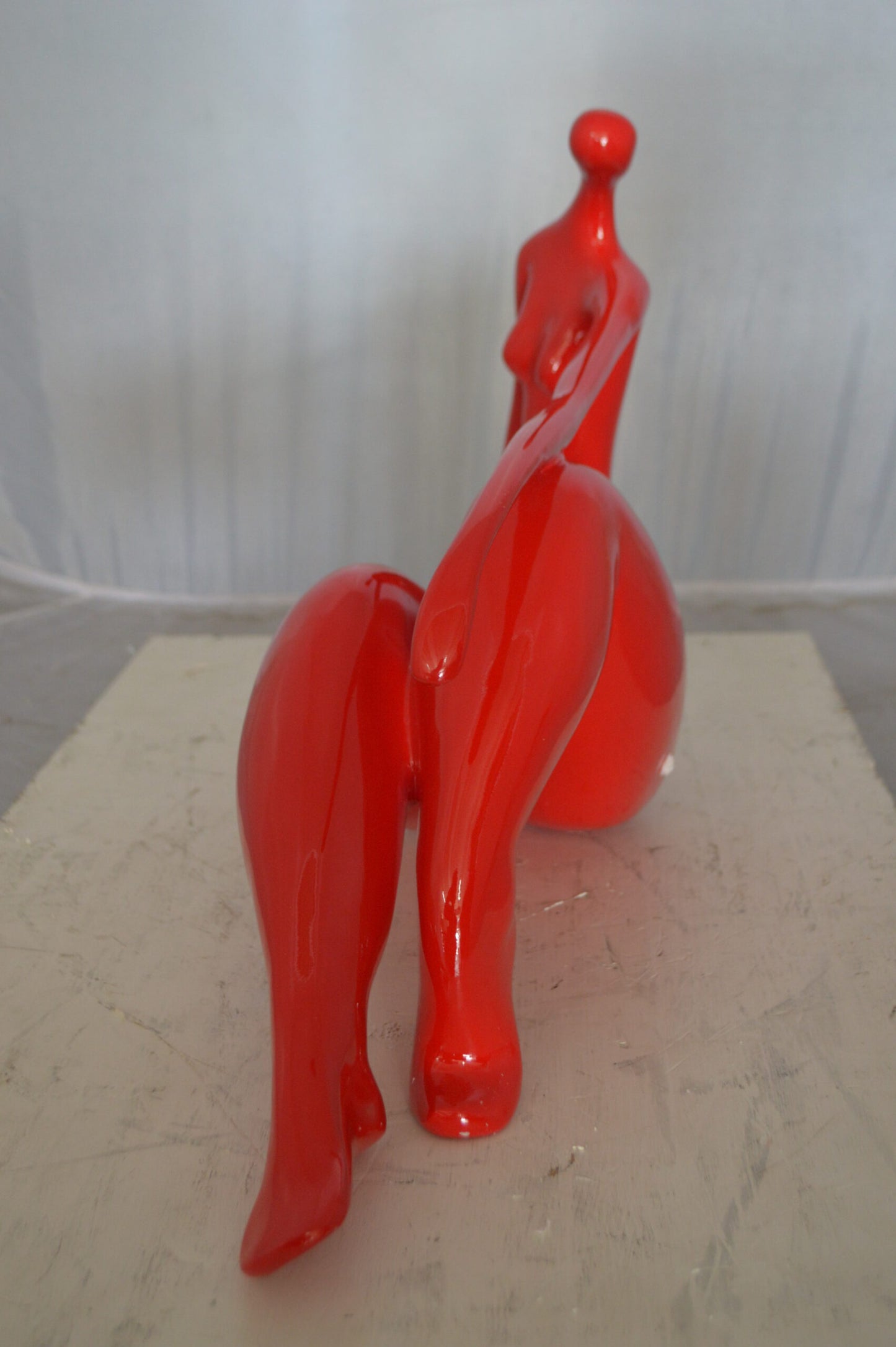 Modern Art Red Women on the Beach Resin Statue - Size: 27"L x 8"W x 15"H.