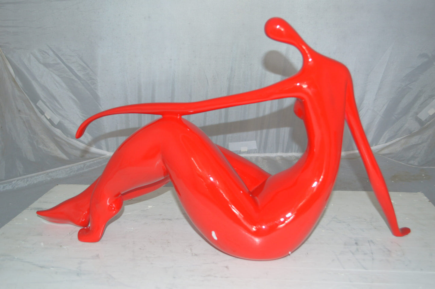 Modern Art Red Women on the Beach Resin Statue - Size: 27"L x 8"W x 15"H.