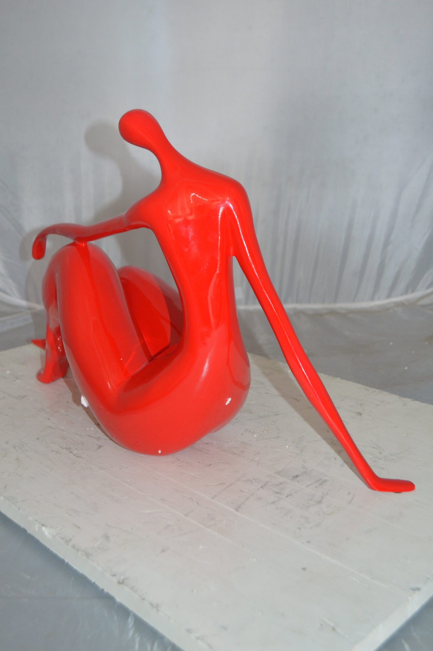 Modern Art Red Women on the Beach Resin Statue - Size: 27"L x 8"W x 15"H.