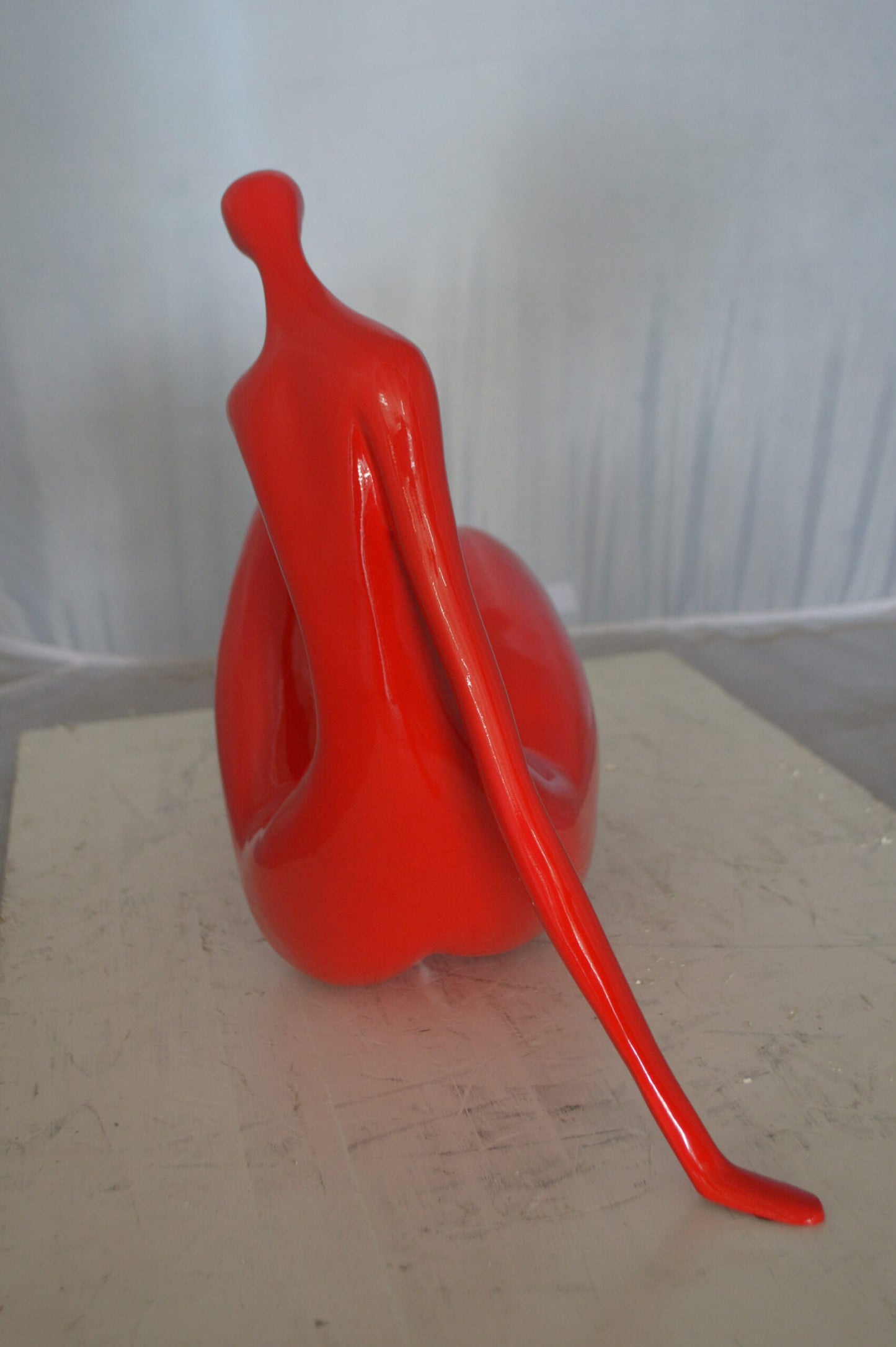Modern Art Red Women on the Beach Resin Statue - Size: 27"L x 8"W x 15"H.