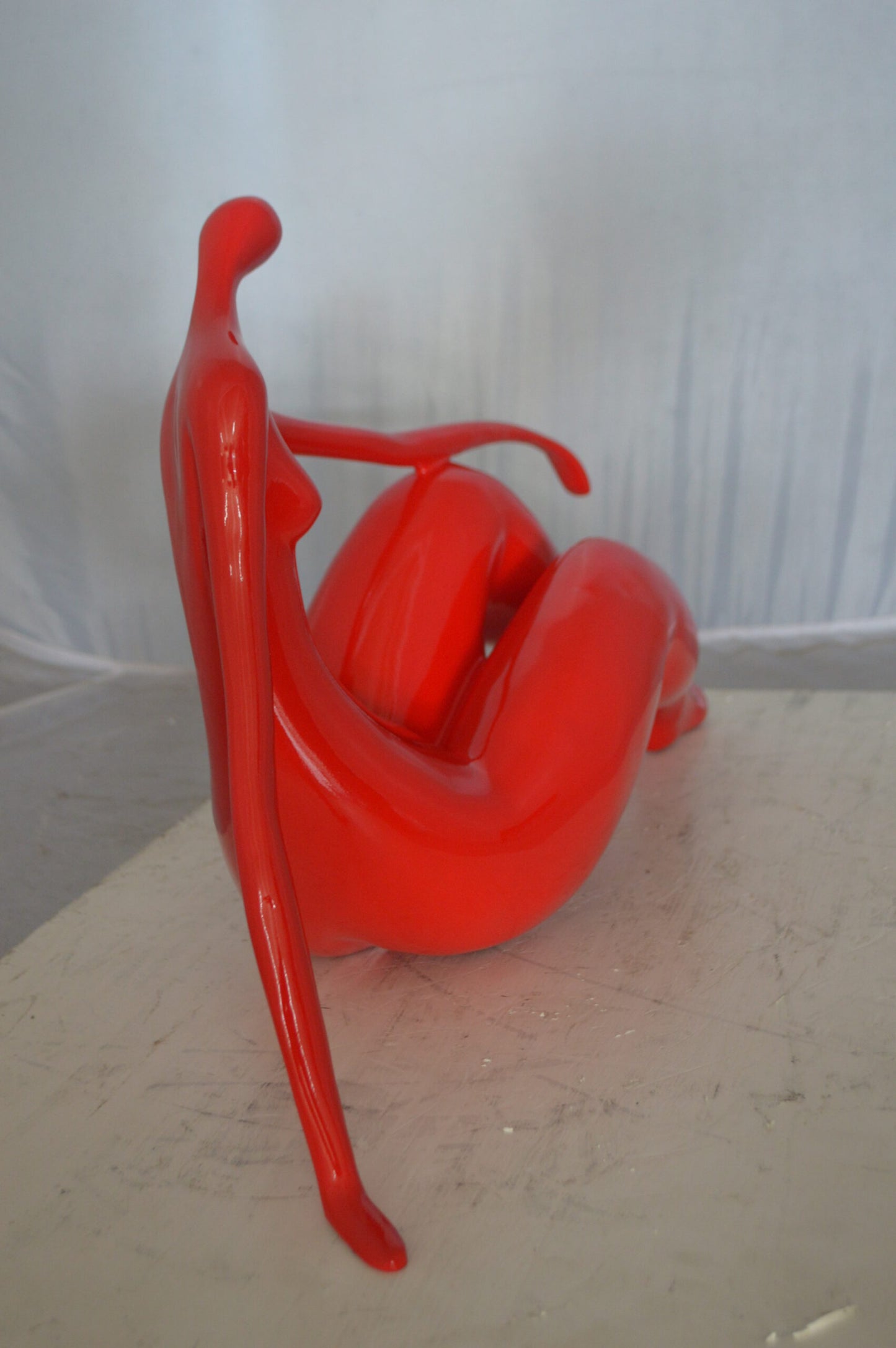 Modern Art Red Women on the Beach Resin Statue - Size: 27"L x 8"W x 15"H.
