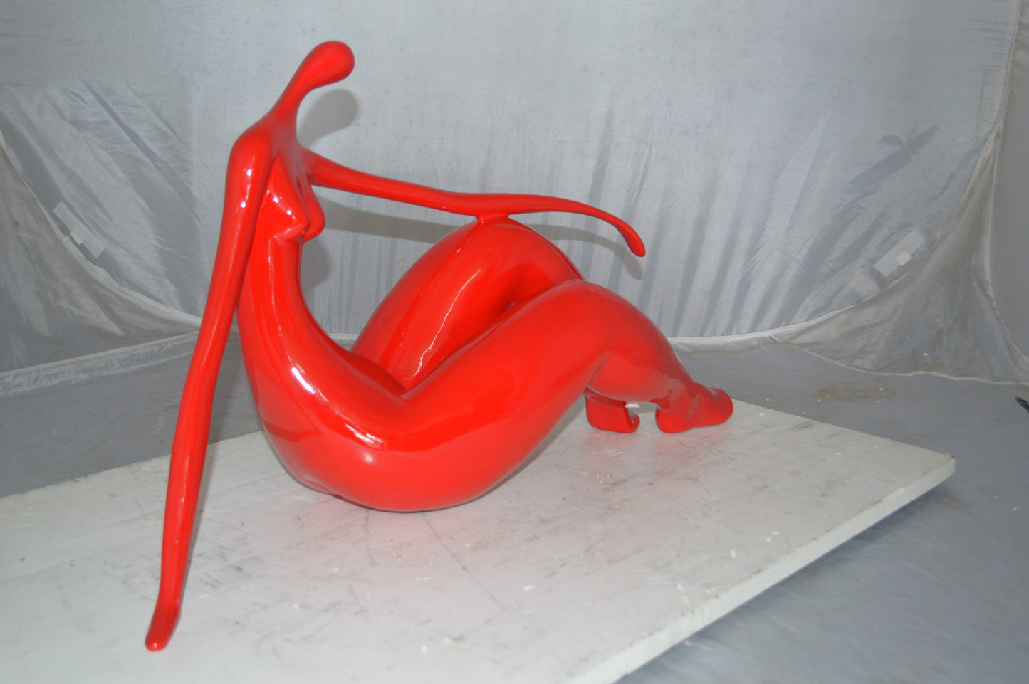 Modern Art Red Women on the Beach Resin Statue - Size: 27"L x 8"W x 15"H.
