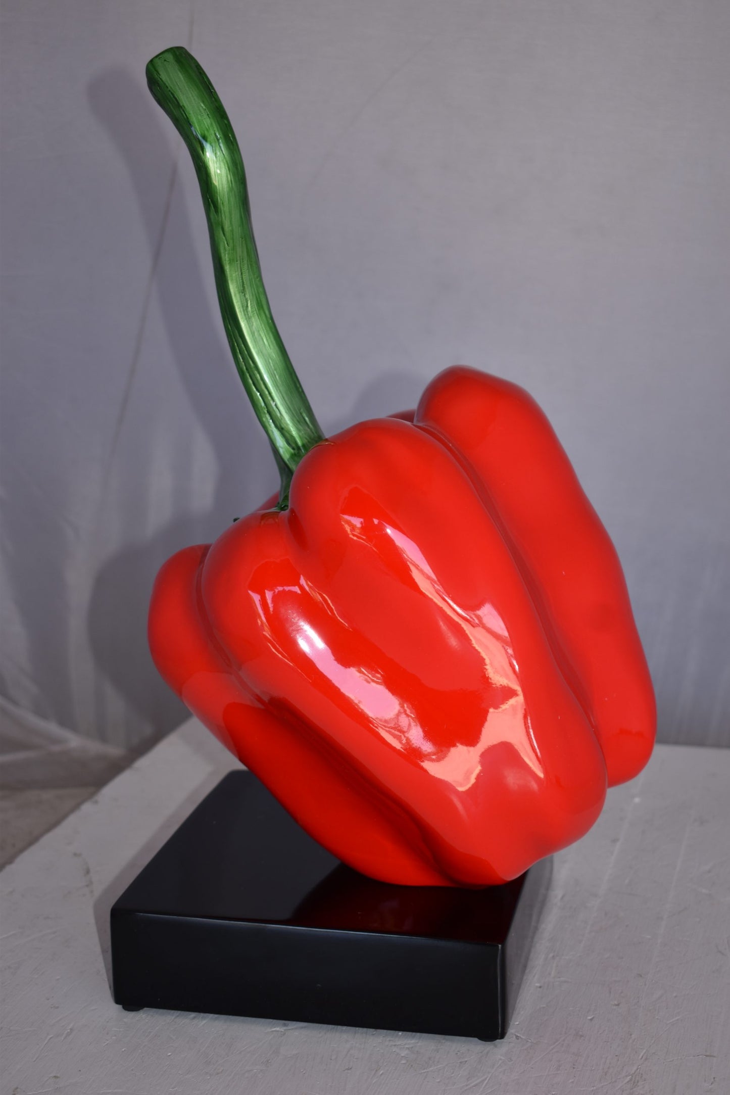 Modern Look of a Giant Red Pepper Mounted on A Base Size: 10" x 12" x 19"H