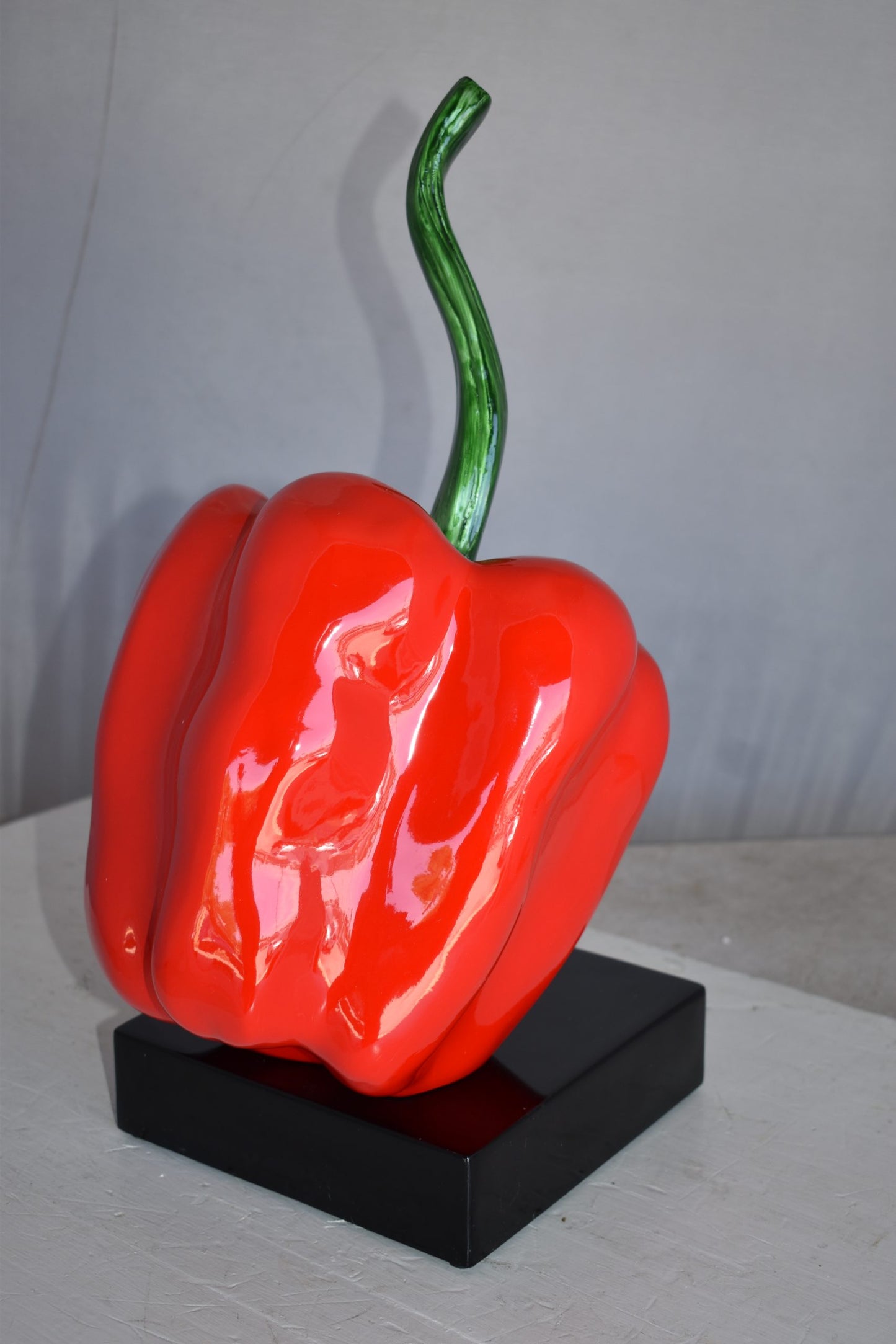 Modern Look of a Giant Red Pepper Mounted on A Base Size: 10" x 12" x 19"H