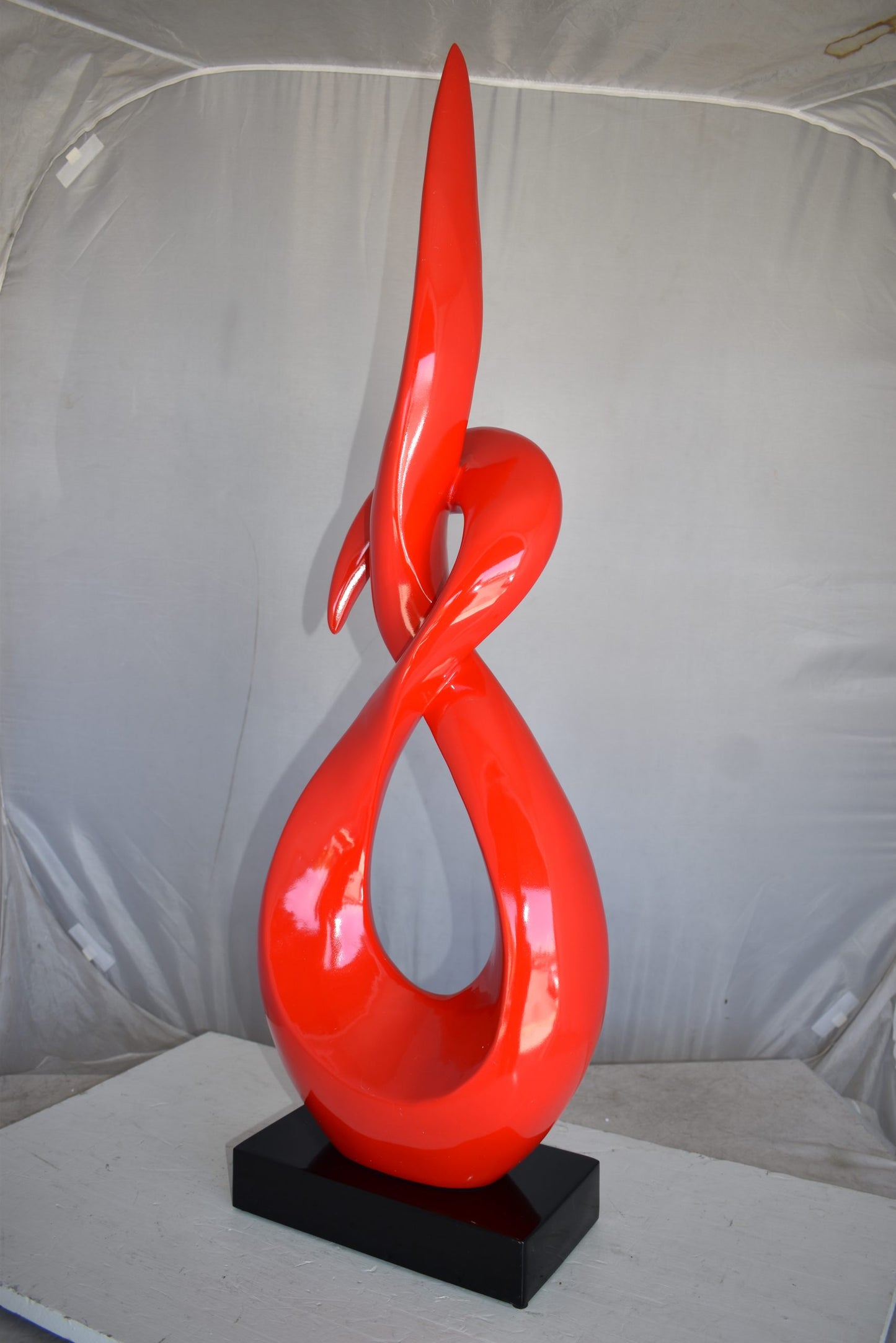 Modern Art Red Eternity Sculpture Made of Resin on A Base Size: 13" x 7" x 42"H