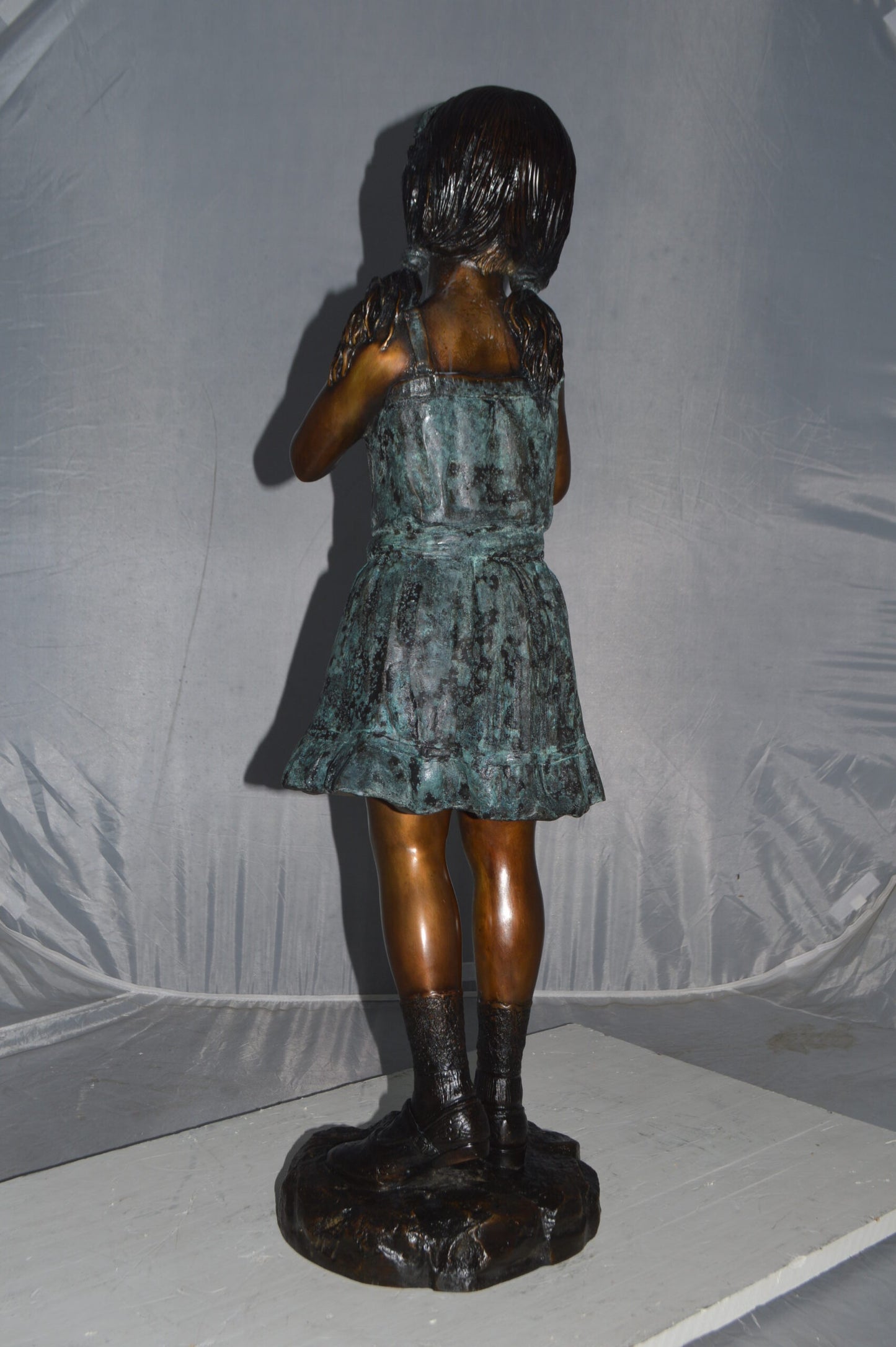 Girl Holding a Bird Bronze Statue - Size: 12"L x 12"W x 34"H.