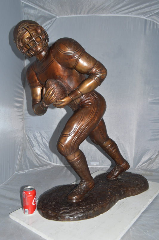 Football player Bronze Statue -  Size: 30"L x 12"W x 36"H.