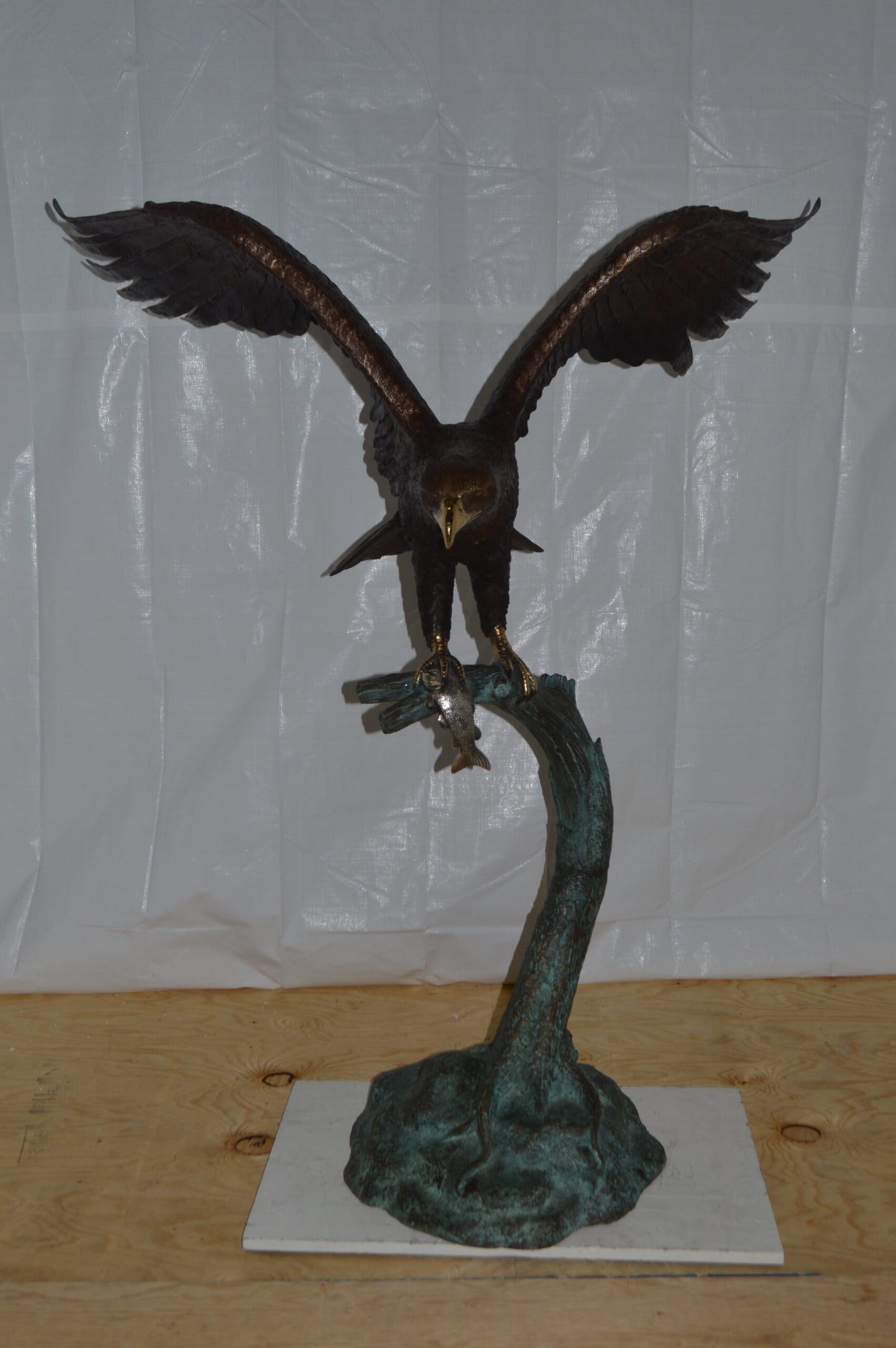 Eagle on a Tree Branch Bronze Statue - Size: 44"L x 50"W x 65"H.