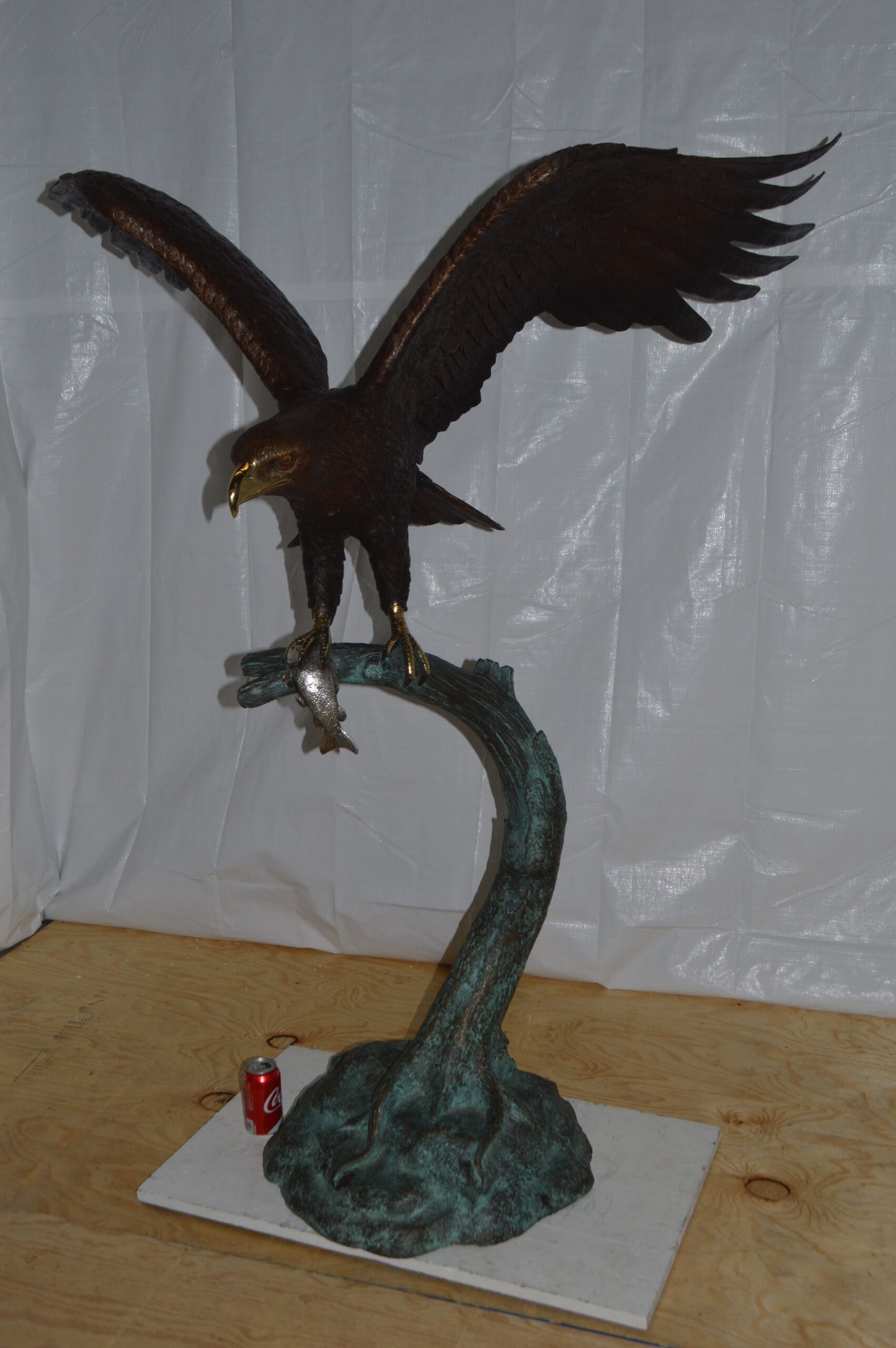 Eagle on a Tree Branch Bronze Statue - Size: 44"L x 50"W x 65"H.