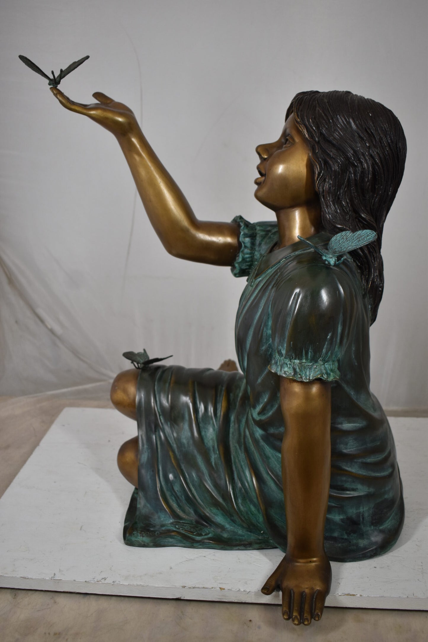 Girl with butterflies, green shirt Bronze Statue Size: 27" x 17" x 24"H