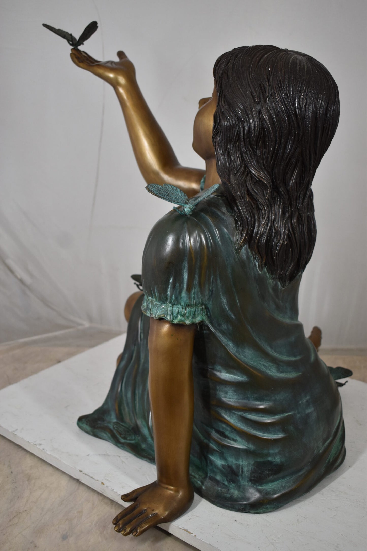 Girl with butterflies, green shirt Bronze Statue Size: 27" x 17" x 24"H