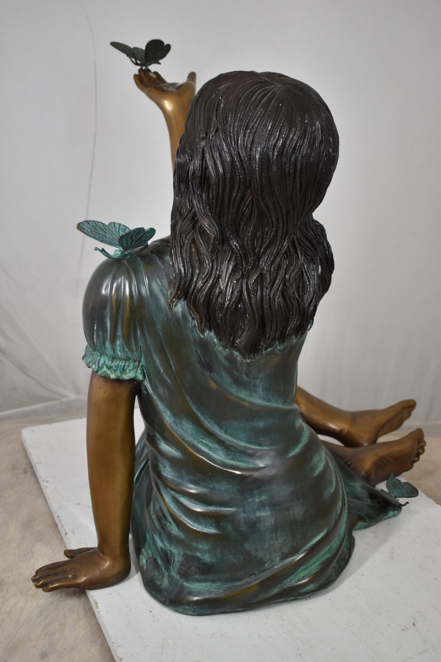 Girl with butterflies, green shirt Bronze Statue Size: 27" x 17" x 24"H