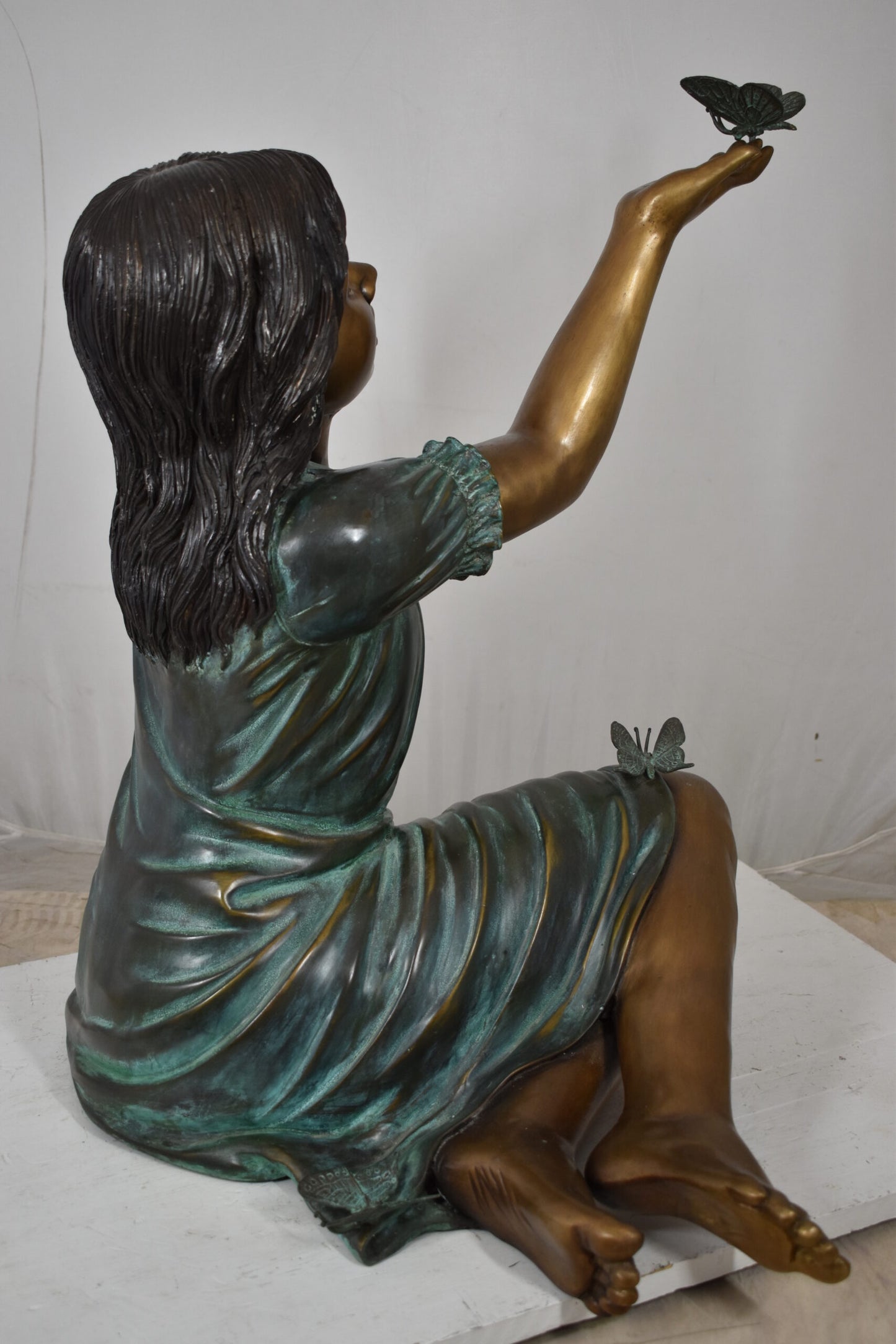 Girl with butterflies, green shirt Bronze Statue Size: 27" x 17" x 24"H