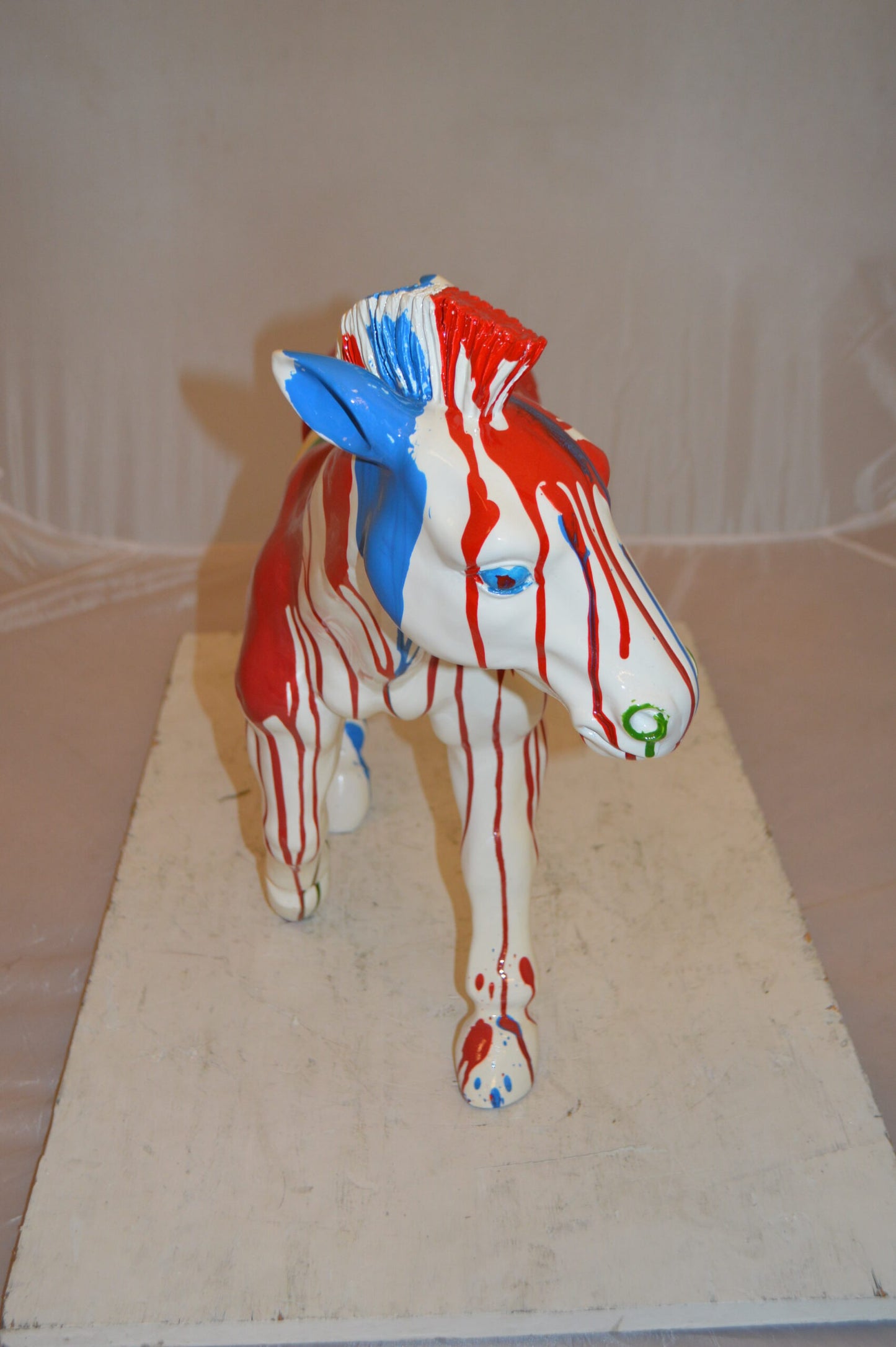 Modern Art Colored Zebra Resin Statue - Size: 29"L x 12"W x 22"H.